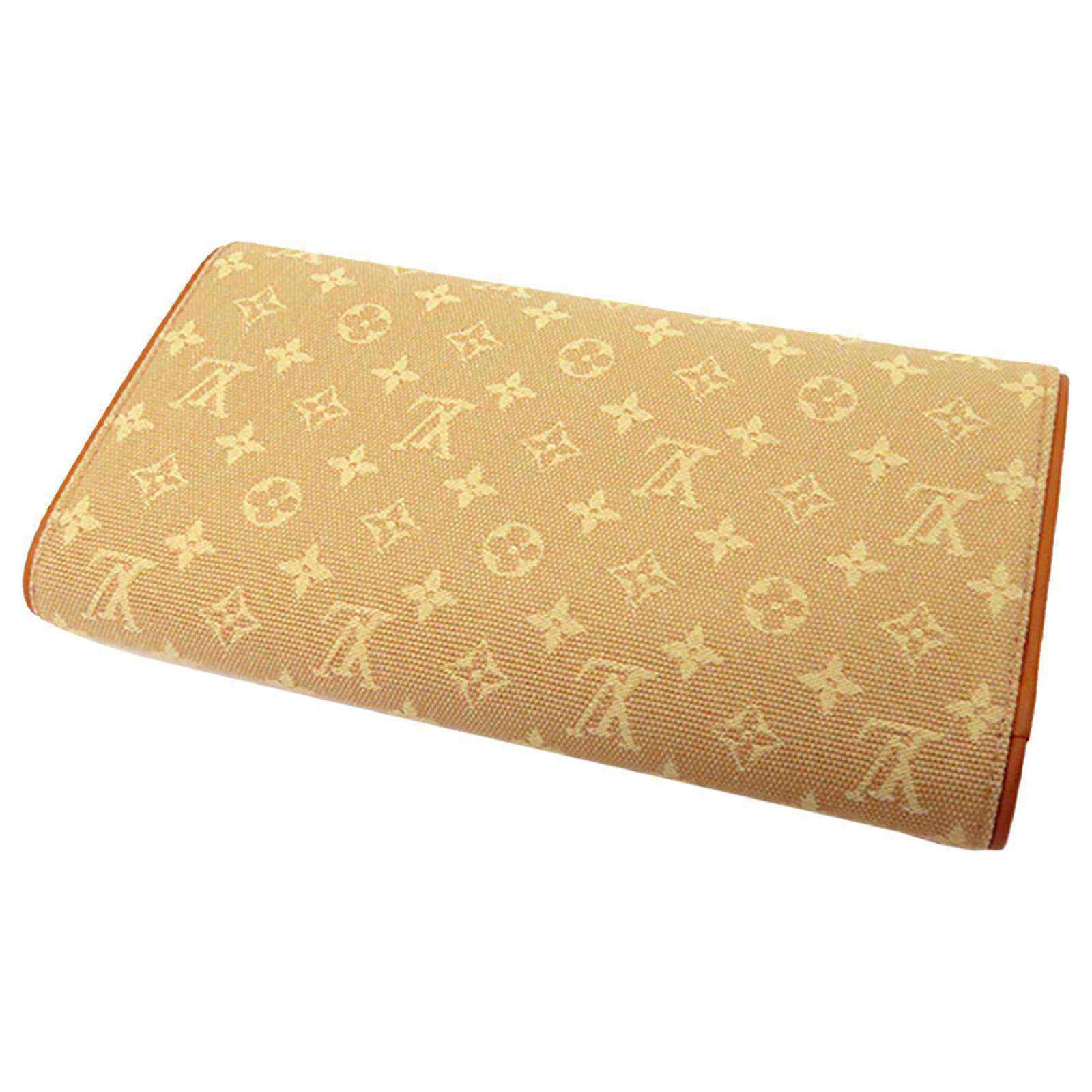 Louis Vuitton Brown Monogram Mini Lin Porte Tresor Wallet Light brown Cloth  ref.597742 - Joli Closet