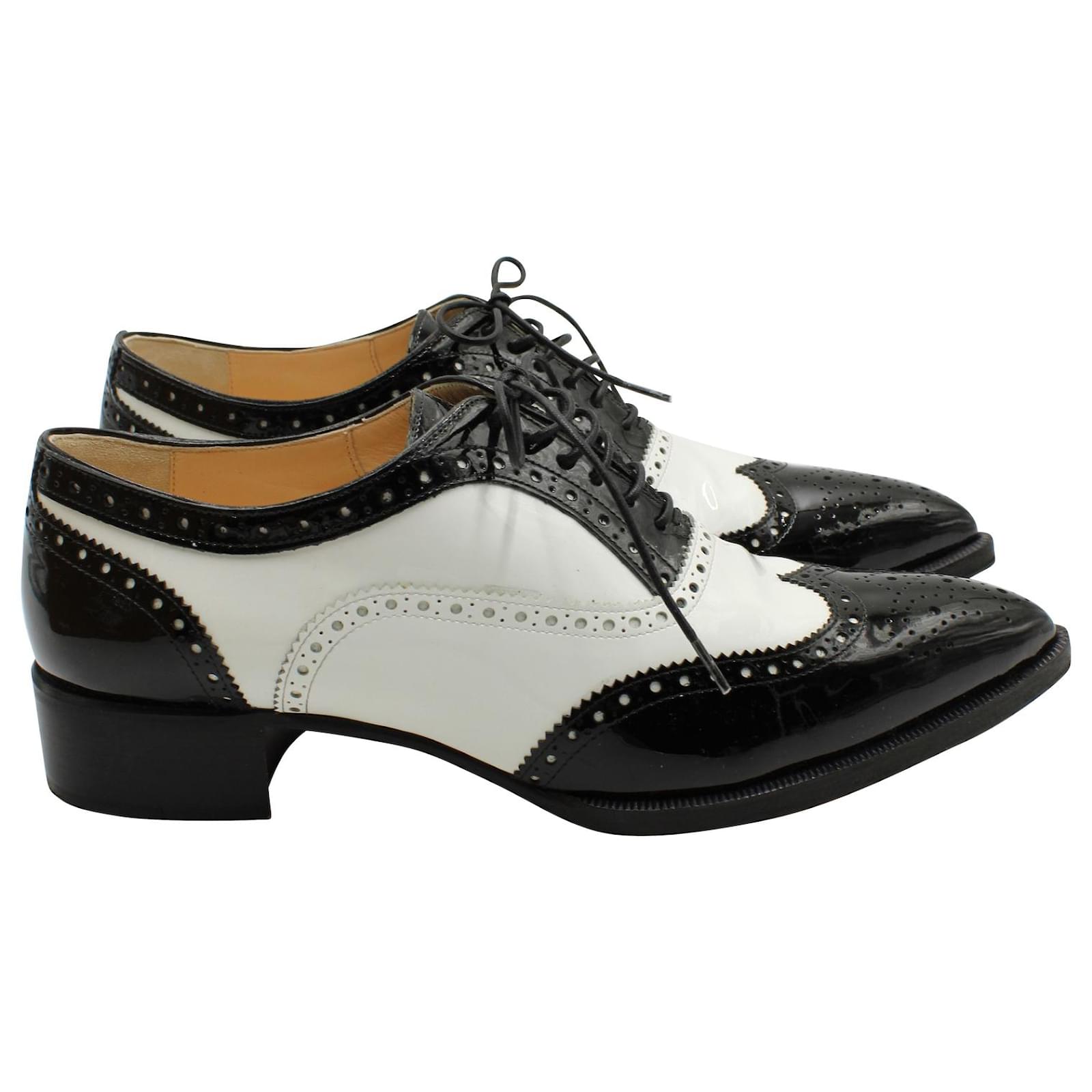 Christian Louboutin Lace Up Brogues in White and Black Leather