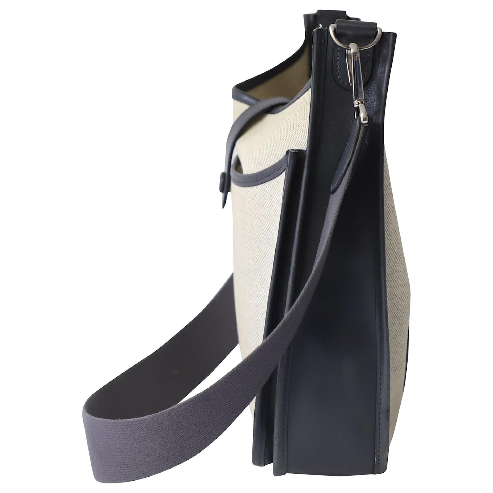 Hermès Hermes Evelyne Crossbody Bag in Cream Canvas and Black Leather White  Cloth ref.613109 - Joli Closet