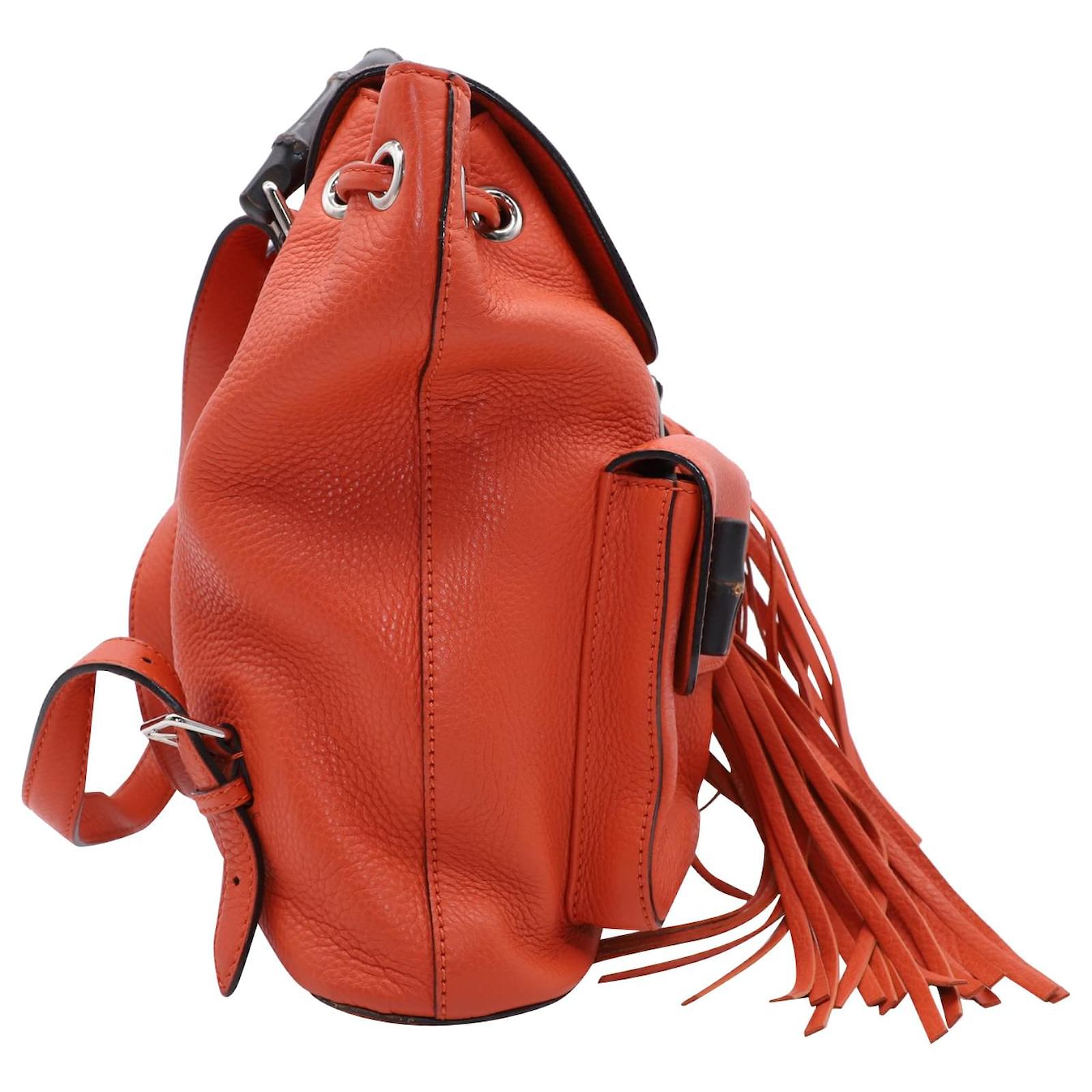 gucci-bamboo-handle-tassel-back-pack-in-orange-leather-ref-615353