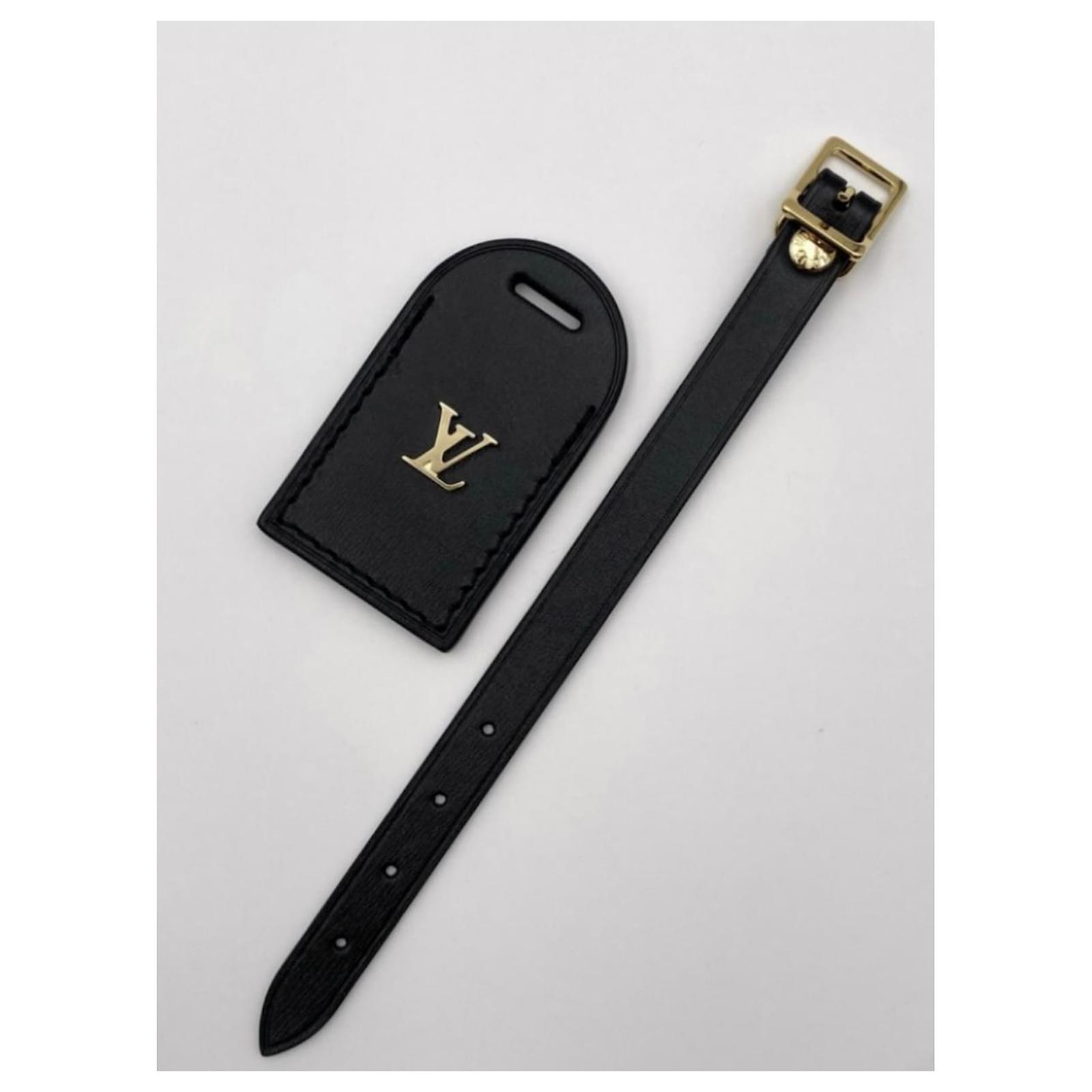 Louis Vuitton luggage tag black Leather ref.622307 - Joli Closet