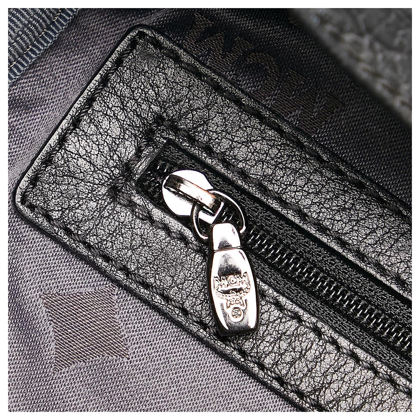 Sac à Dos MCM Stark Medium - Cuir Visetos Noir - Très Bon État - Unisexe