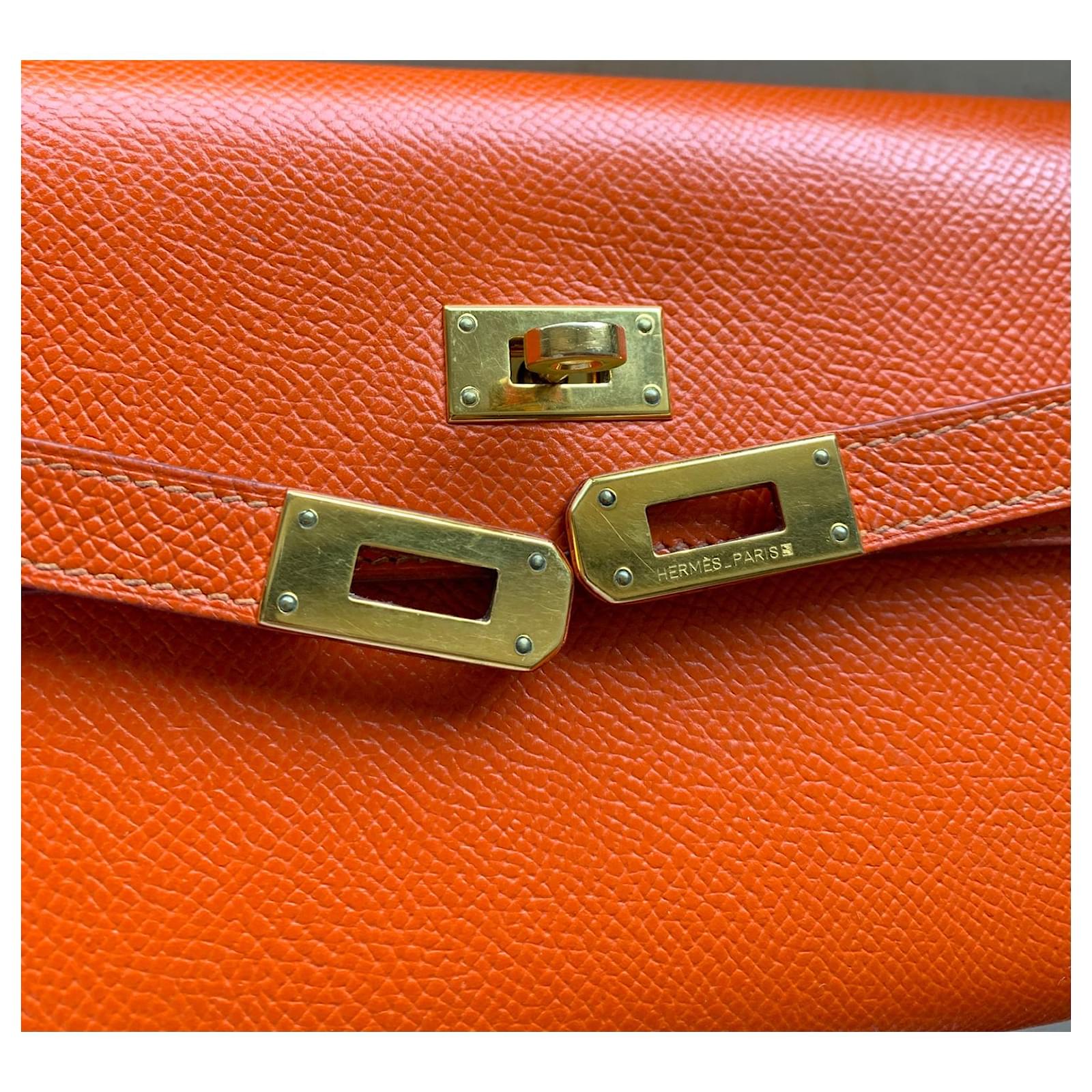 Hermès Kelly wallet Orange Leather Joli Closet