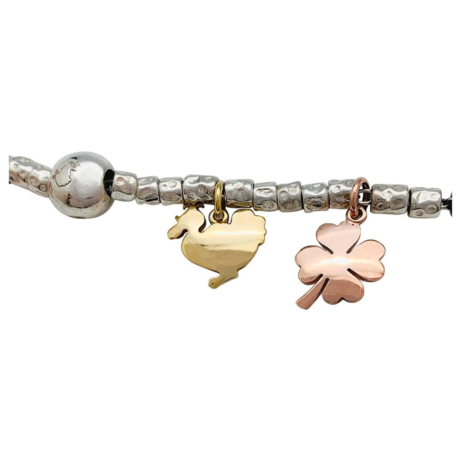 Dodo Pomellato Dodo charm bracelet, silver and gold. Yellow