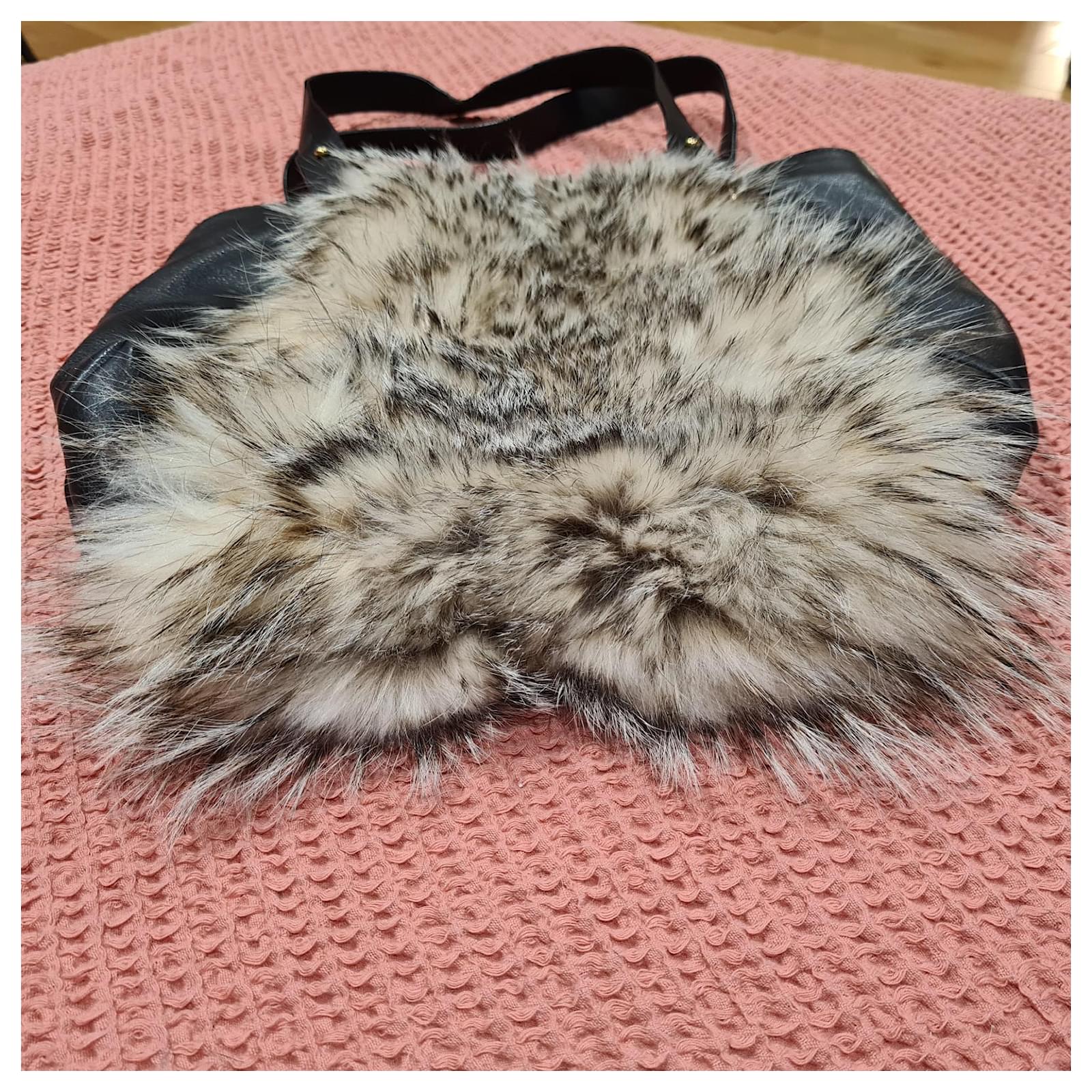 Magnificent and rare Christian Louboutin fur bag Very Black