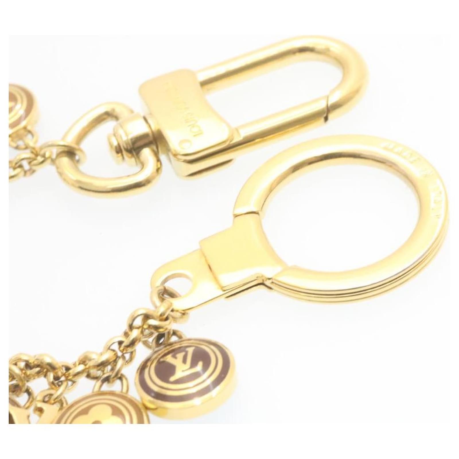 LOUIS VUITTON Porte Cles Chainne Pastille Bag Charm Gold M65386 LV Auth  am1035g Golden Metal ref.633431 - Joli Closet