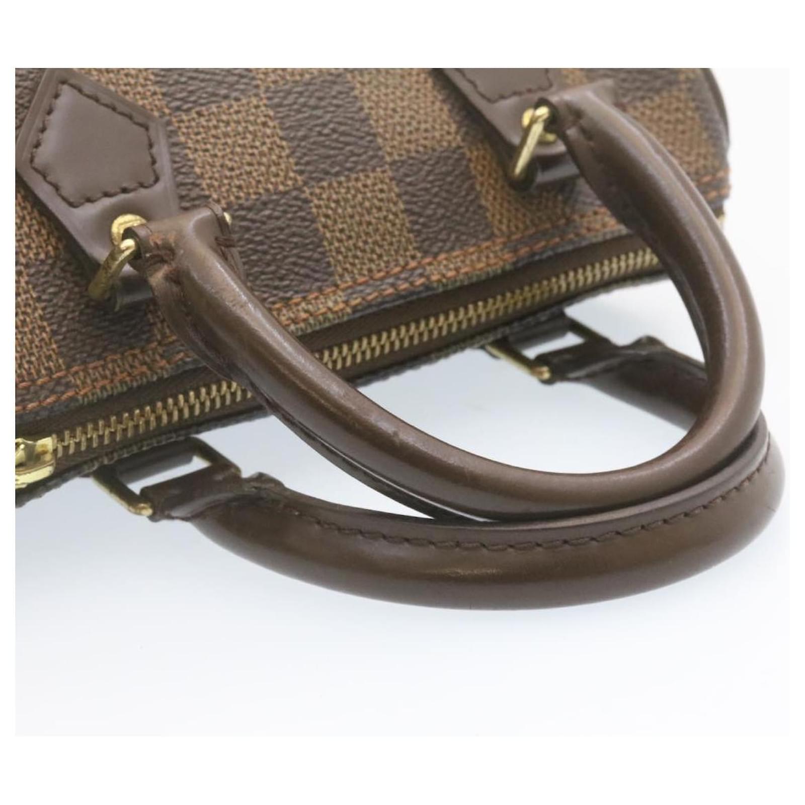 LOUIS VUITTON Damier Ebene Mini Speedy Hand Bag SP Order LV Auth 23260a  ref.635914 - Joli Closet
