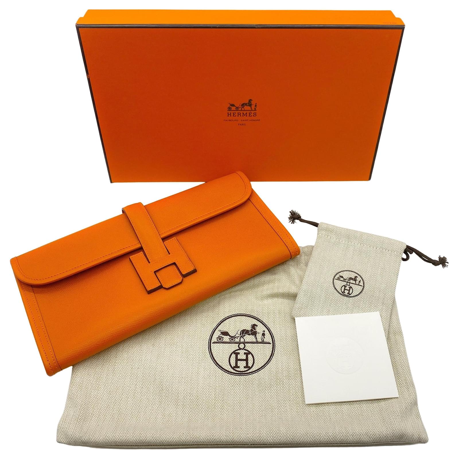 Jige leather clutch bag Hermès Orange in Leather - 29871250