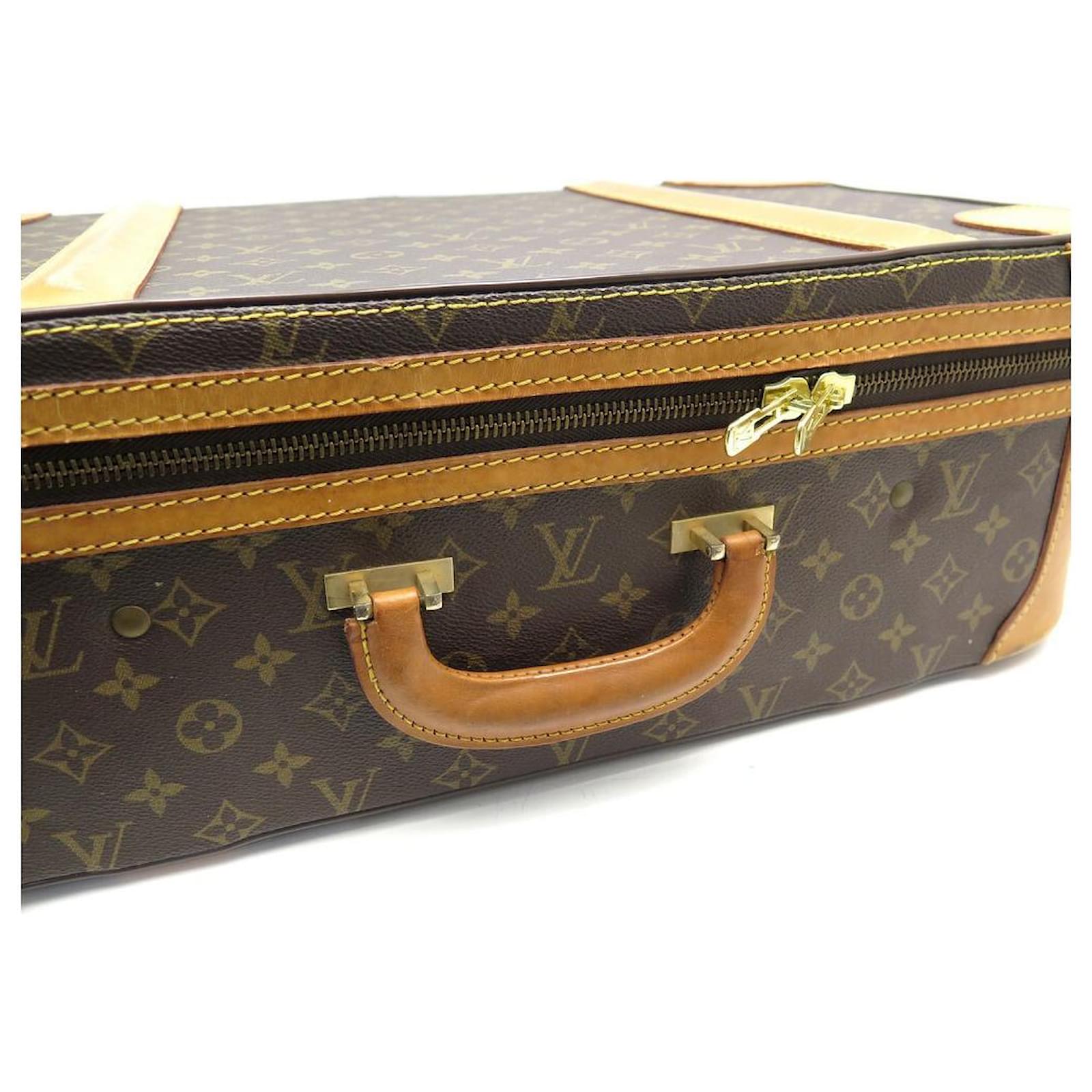 LOT:1746  Louis Vuitton Stratos 55 vintage suitcase in monogram ca