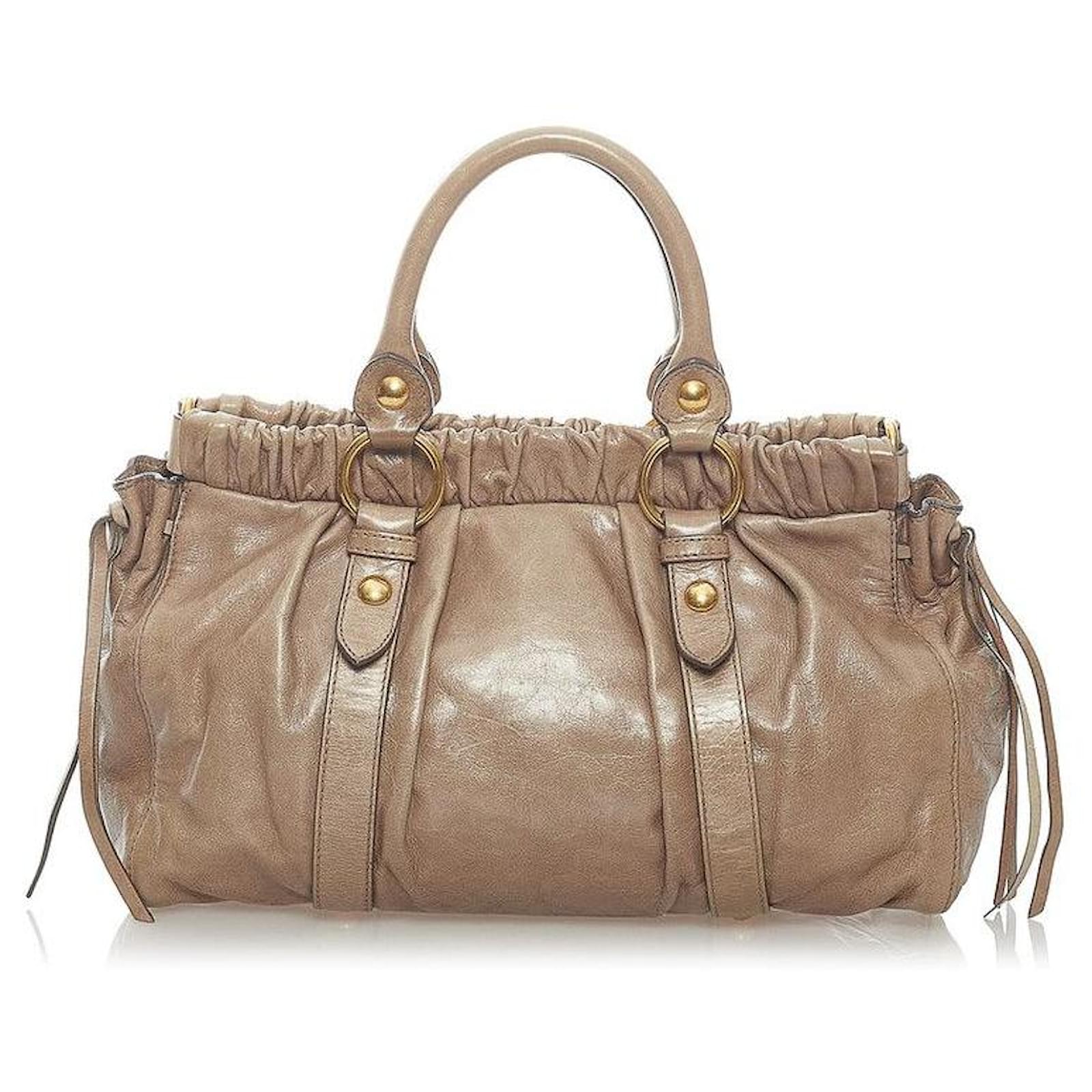 Miu Miu Vitello Lux Handbag RT0383 Beige Leather Pony-style calfskin  ref.945916 - Joli Closet