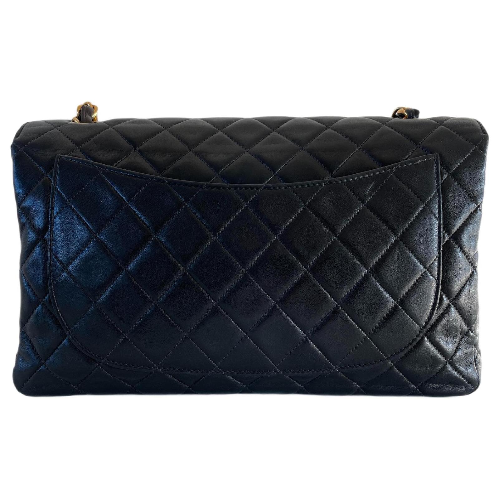 Chanel classic single flap bag jumbo black lambskin gold hardware