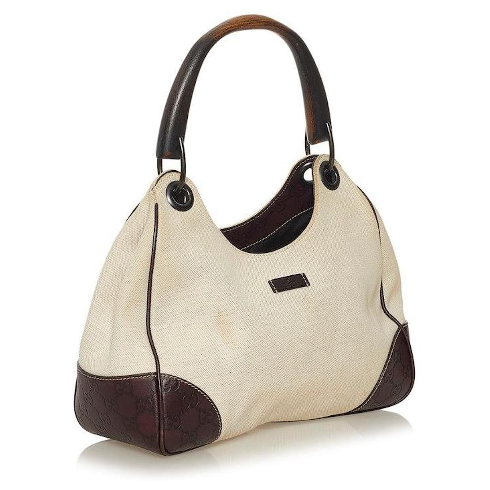 Gucci Brown Vintage Square G Suede Hobo Bag Beige Leather Pony-style  calfskin ref.563482 - Joli Closet