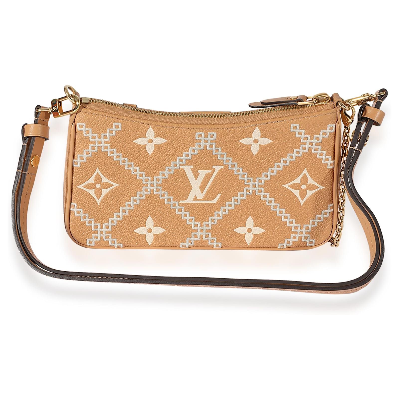 Louis Vuitton Arizona Cream Empreinte Broderies Easy Pouch On Strap Brown  ref.667697 - Joli Closet