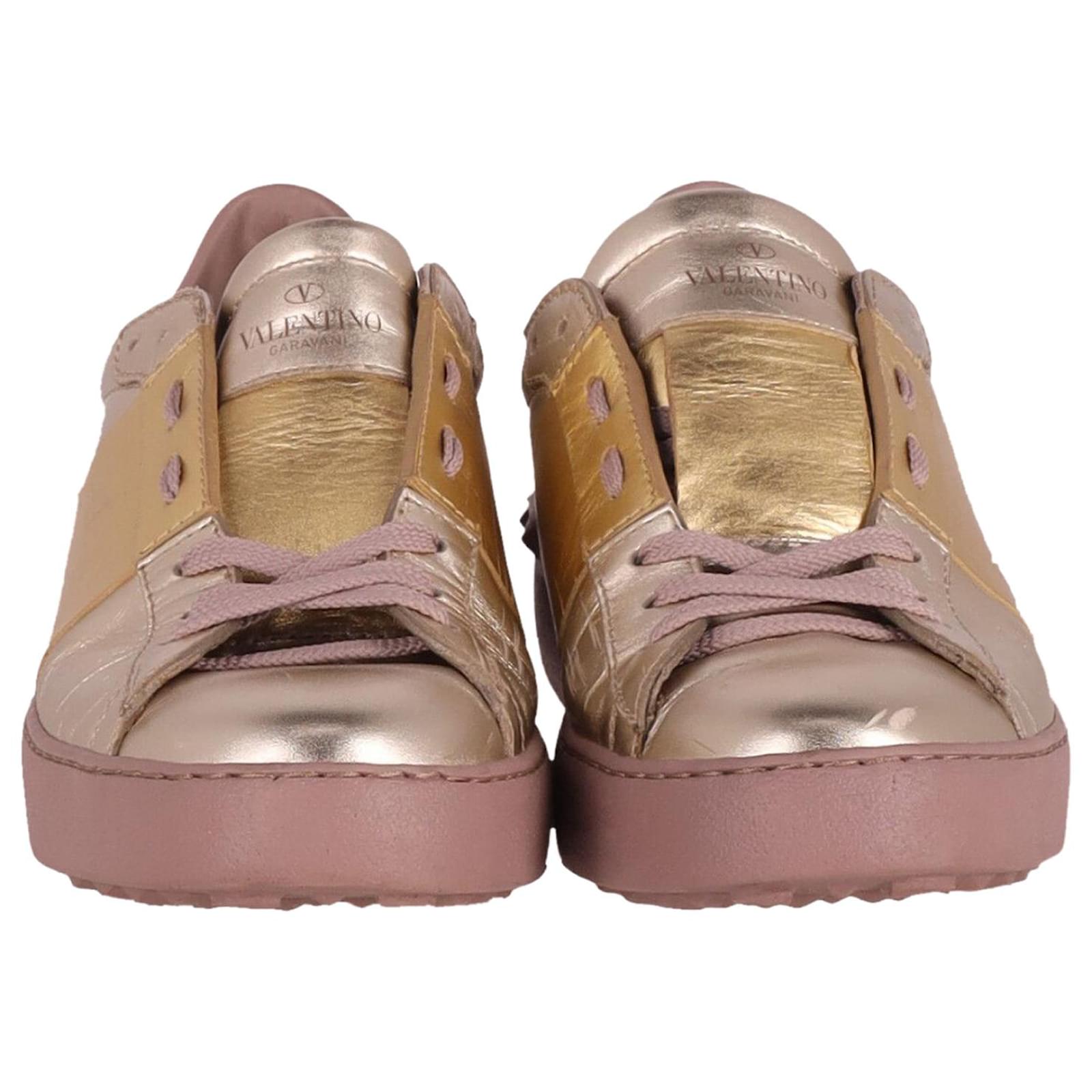 Valentino Rockstud Open Low-Top Sneakers in Metallic Gold Leather