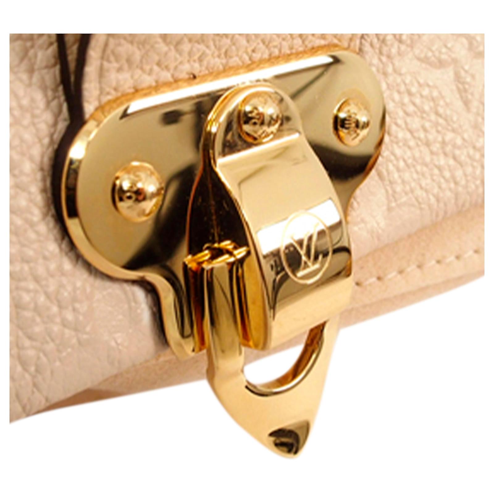 Louis Vuitton Brown Monogram Empreinte Vavin BB Beige Leather Pony-style  calfskin ref.673030 - Joli Closet