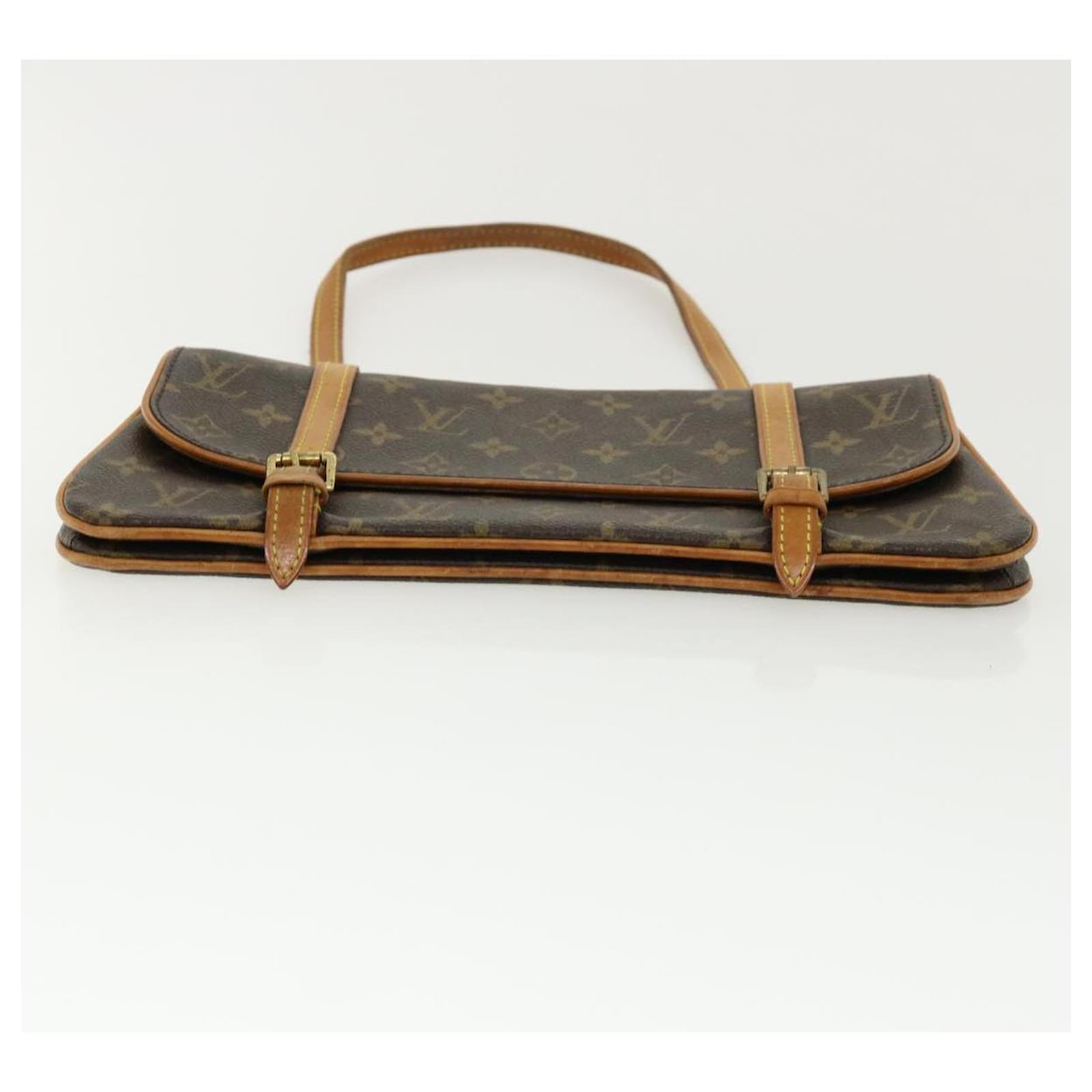 Pre-owned Louis Vuitton Marelle Vintage Cloth Handbag In Brown
