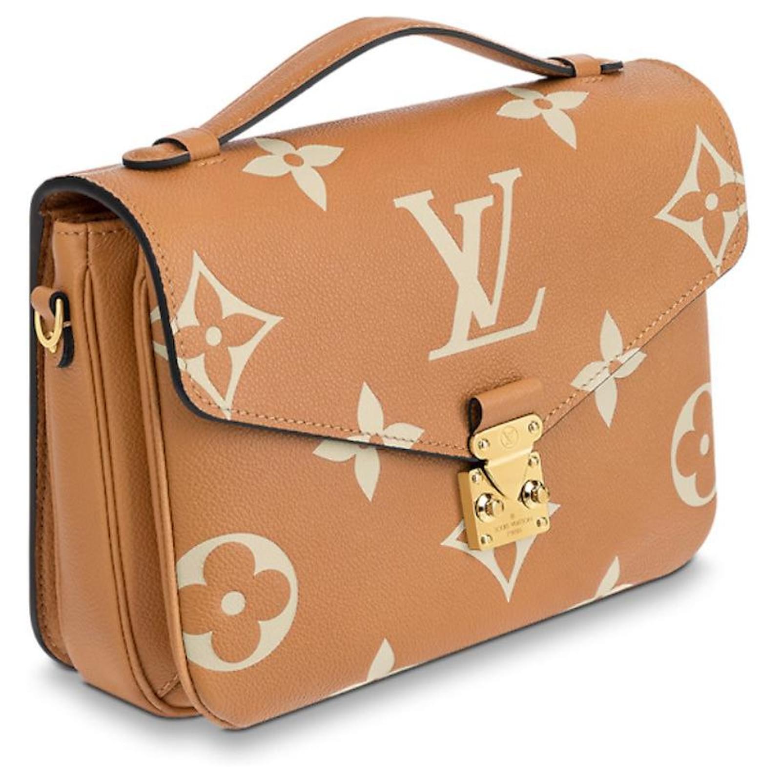 Metis leather clutch bag Louis Vuitton Beige in Leather - 35509224