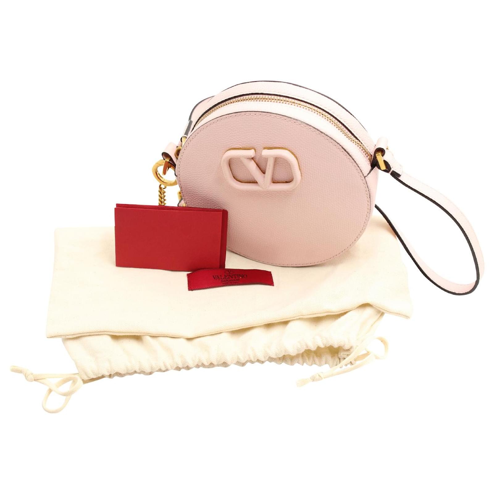 Valentino Garavani Vlogo Round Crossbody Bag in Pastel Pink Leather  ref.679392 - Joli Closet