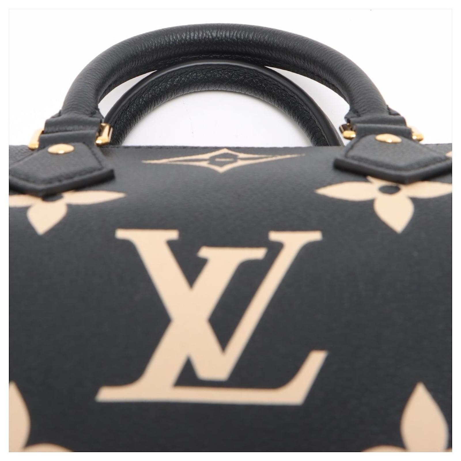 Louis Vuitton Speedy 25 Bandouliere Bag Bicolor Monogram Empreinte Giant  Black Leather ref.686262 - Joli Closet