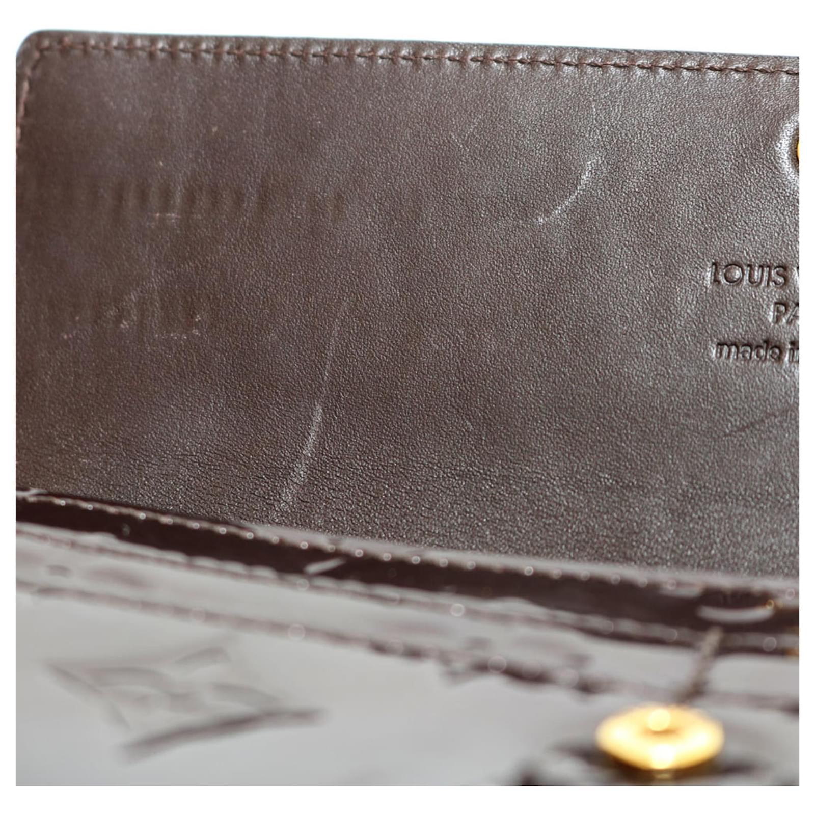 Louis Vuitton Portefeuille Sarah Navy blue Patent leather ref.666840 - Joli  Closet