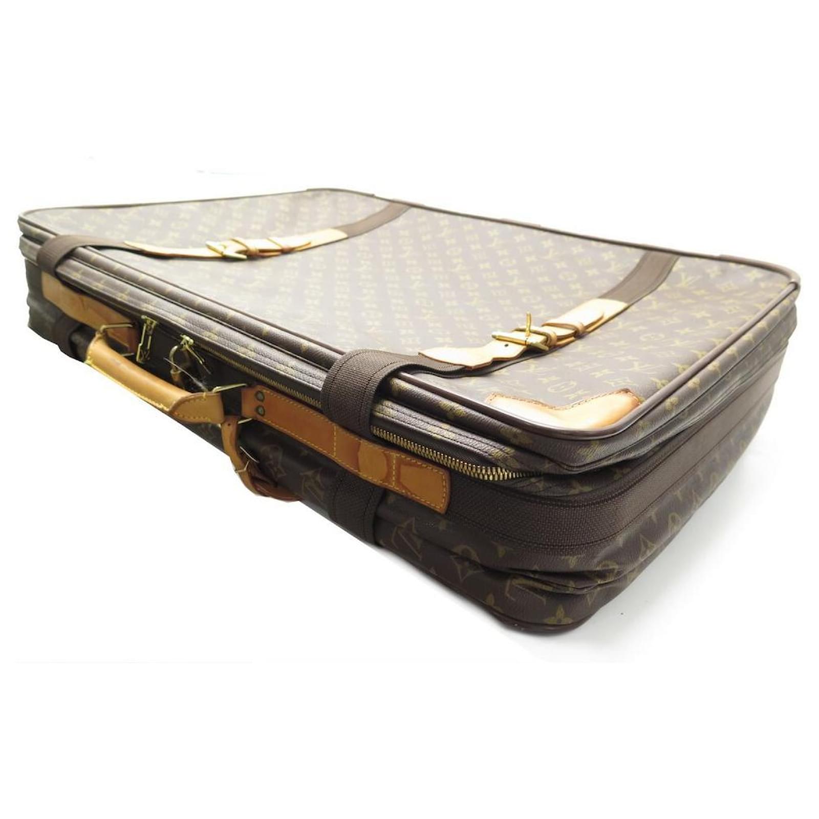 Small vintage travel suitcase Satellite by LOUIS VUITT…