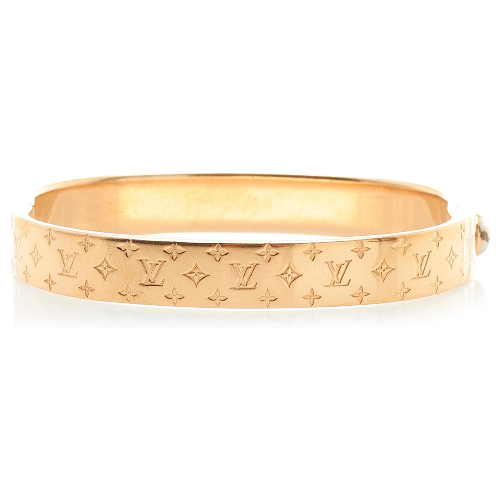 Louis Vuitton Nanogram Cuff Bracelet in Goldtone Brass Golden