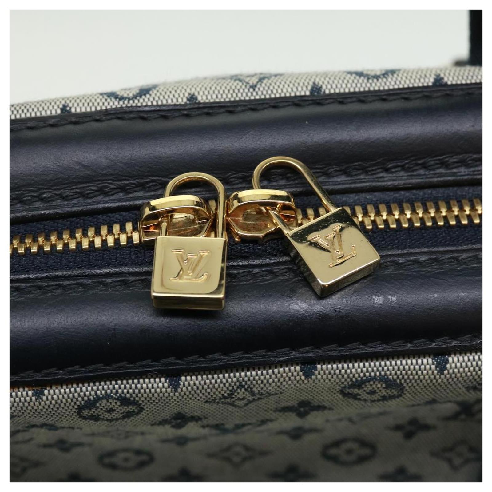 The Iconic Louis Vuitton Manhattan Handbag – Interfaith Ministries