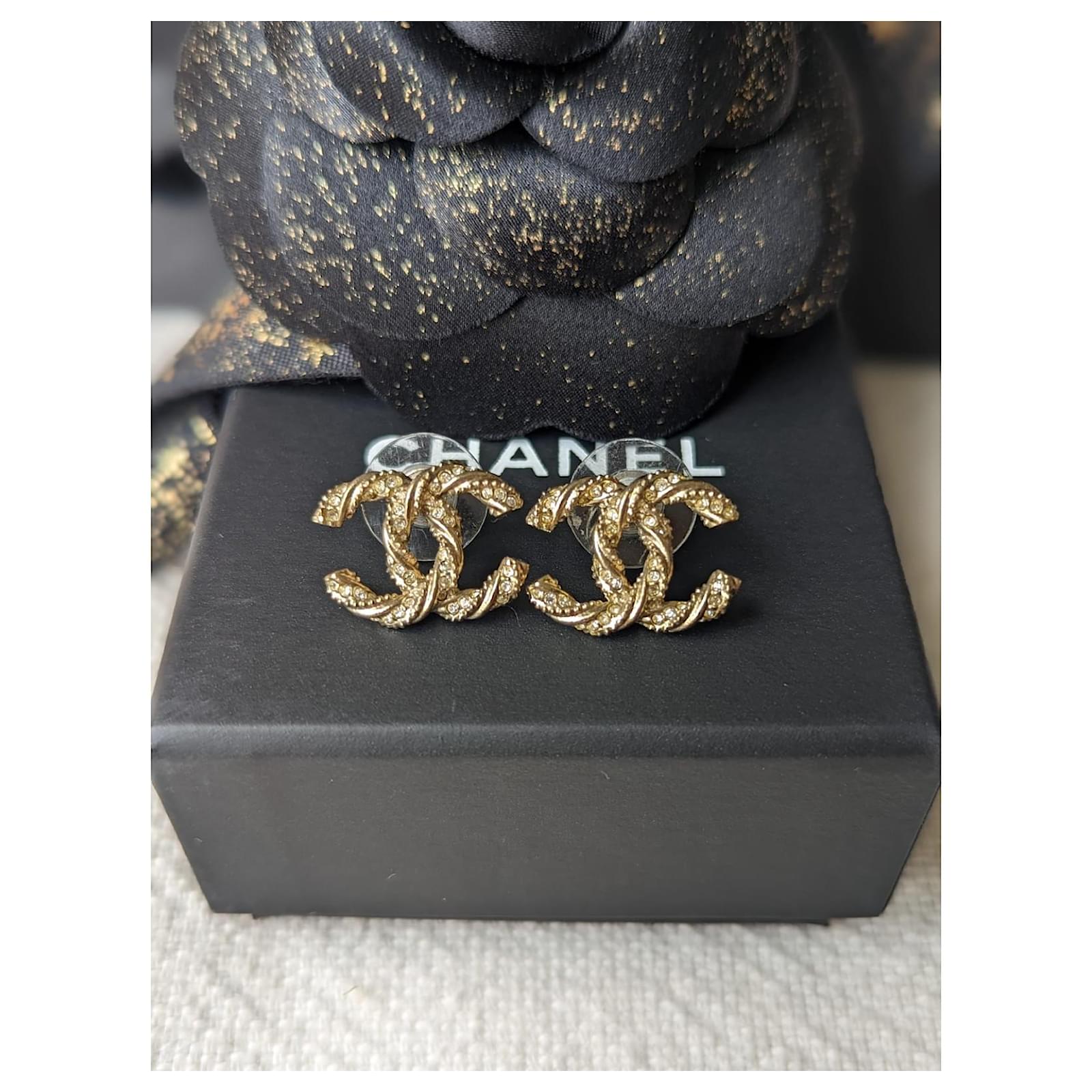Chanel CC F14V Twisted crystal logo earrings gold colour