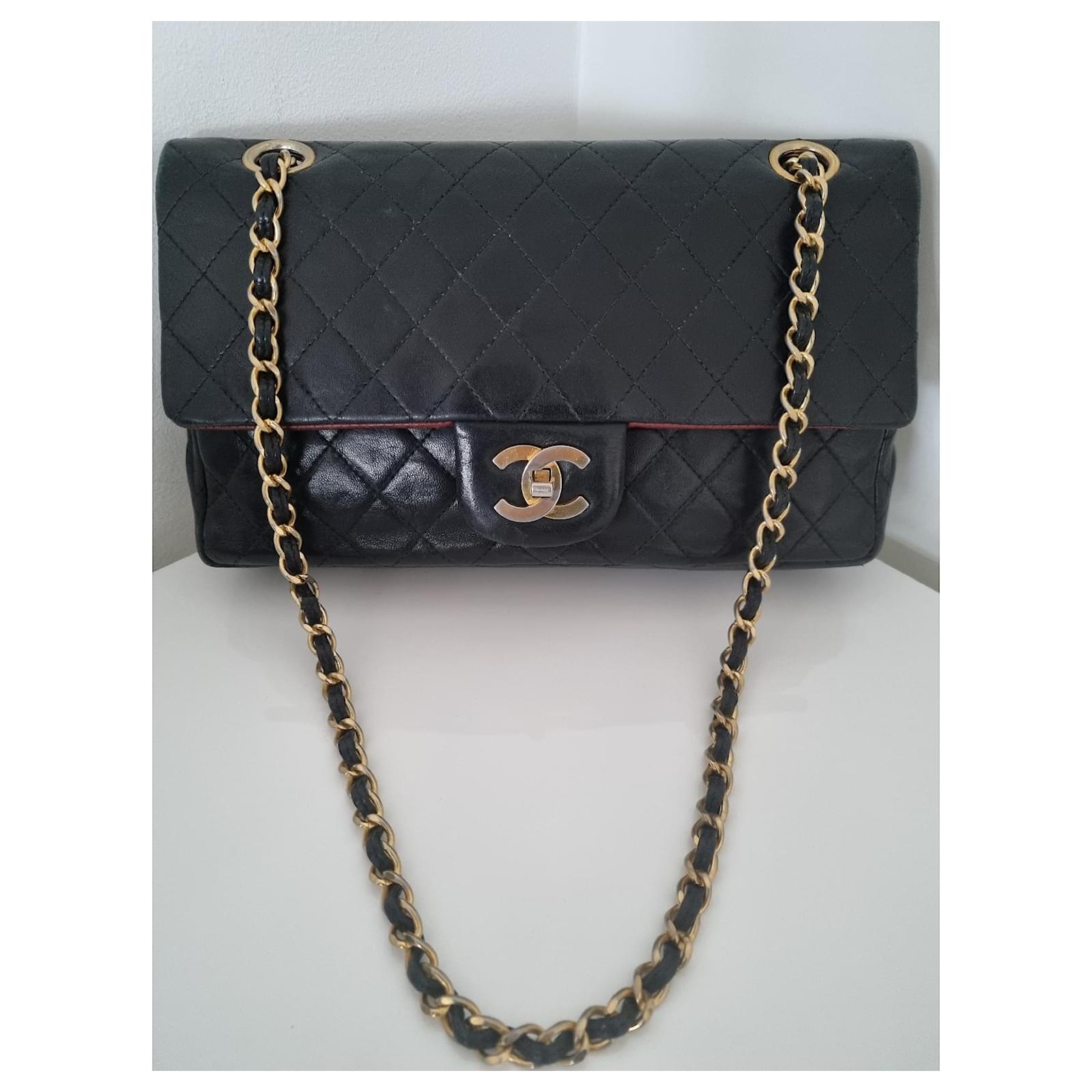 Timeless Chanel vintage black lambskin leather quilted medium lined flap bag  ref.725859 - Joli Closet