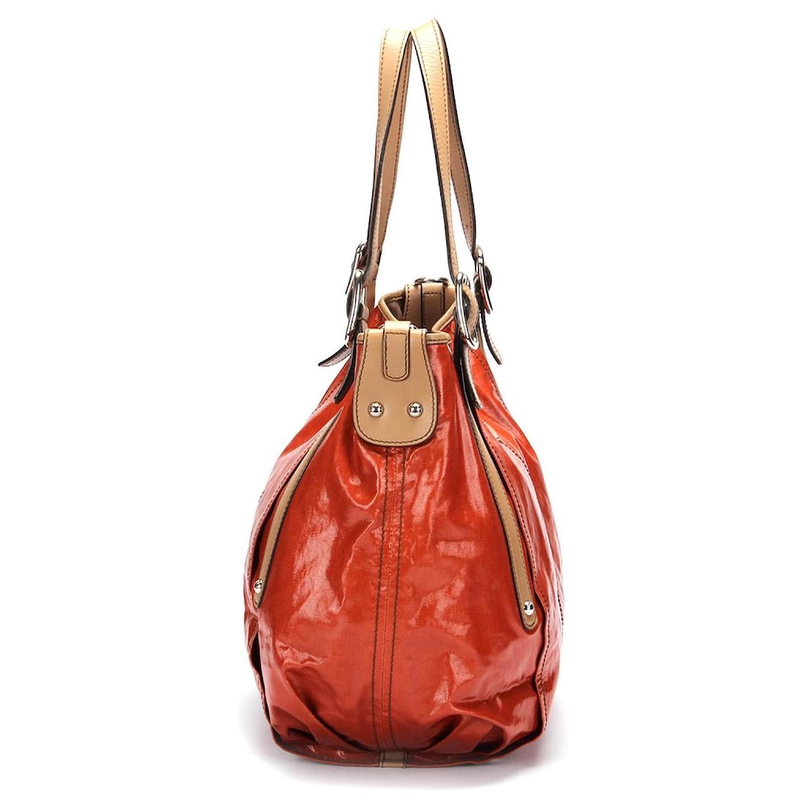 Tod's Patent Coated Canvas Bucket Bag