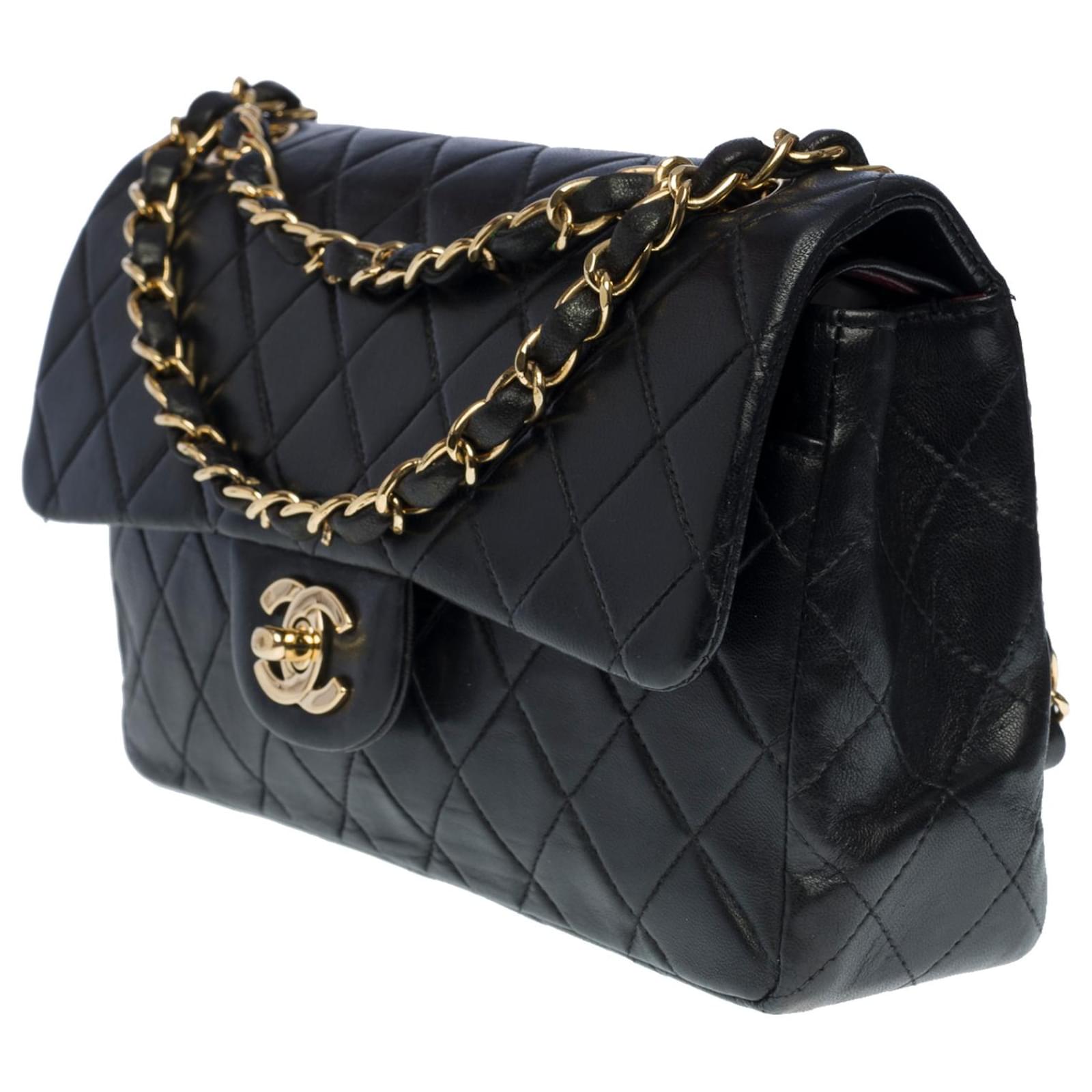 The Iconic Must Have Chanel Timeless Bag 23 cm with lined flap in black  quilted lambskin, ref.734989 - Joli Closet