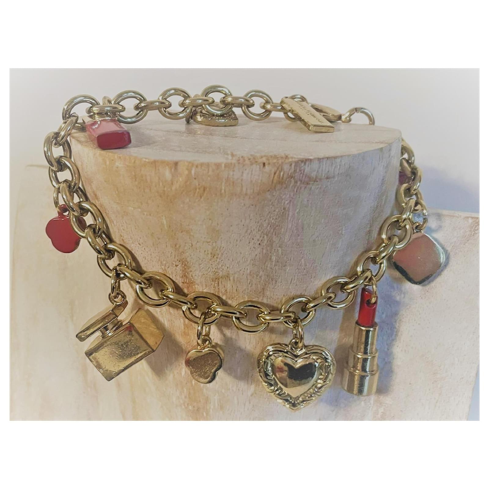 Dolce & Gabbana golden steel bracelet with lipstick charms  -  Joli Closet