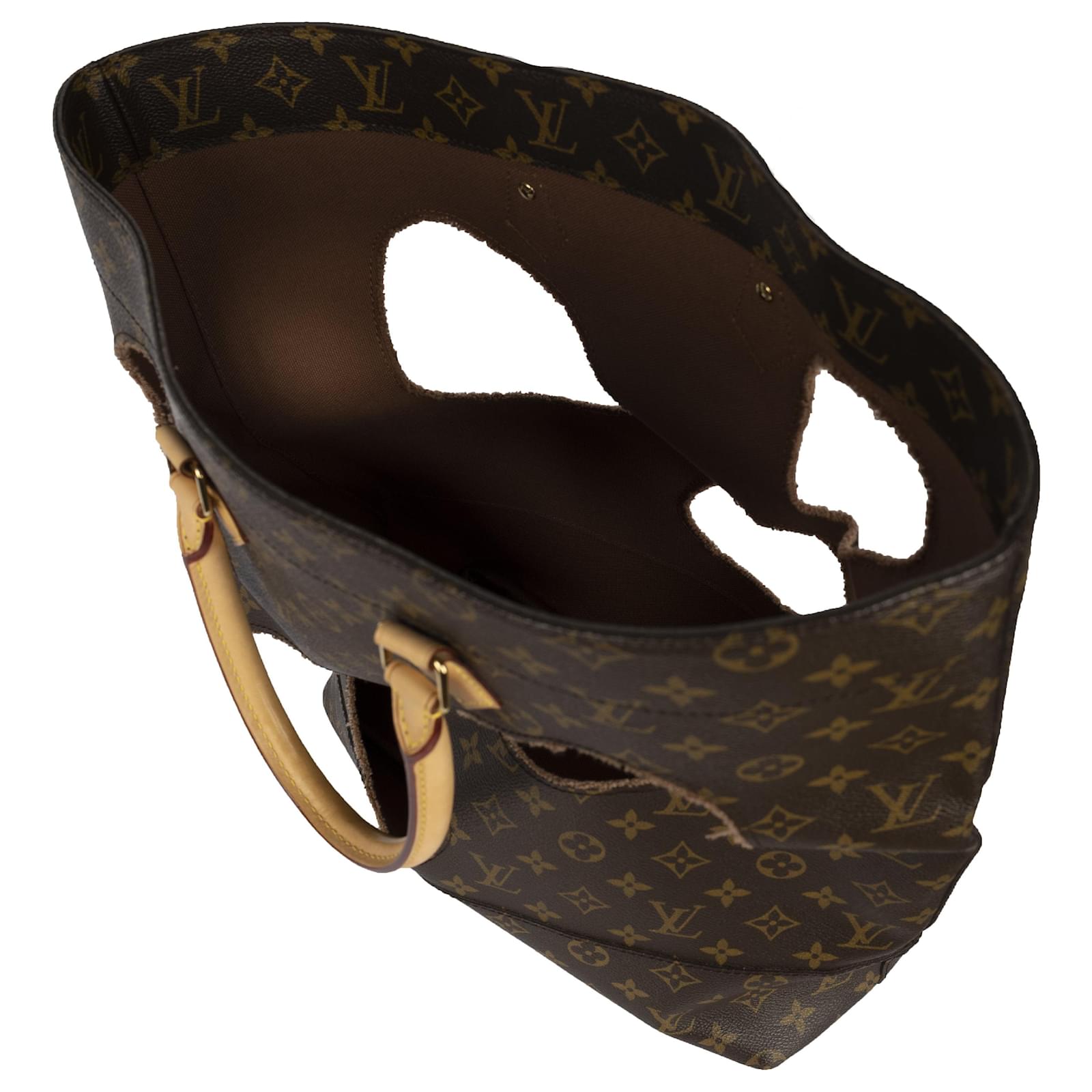 Louis Vuitton x Comme des Garçons Burned Holes Monogram Tote bag Brown  Leather ref.753678 - Joli Closet