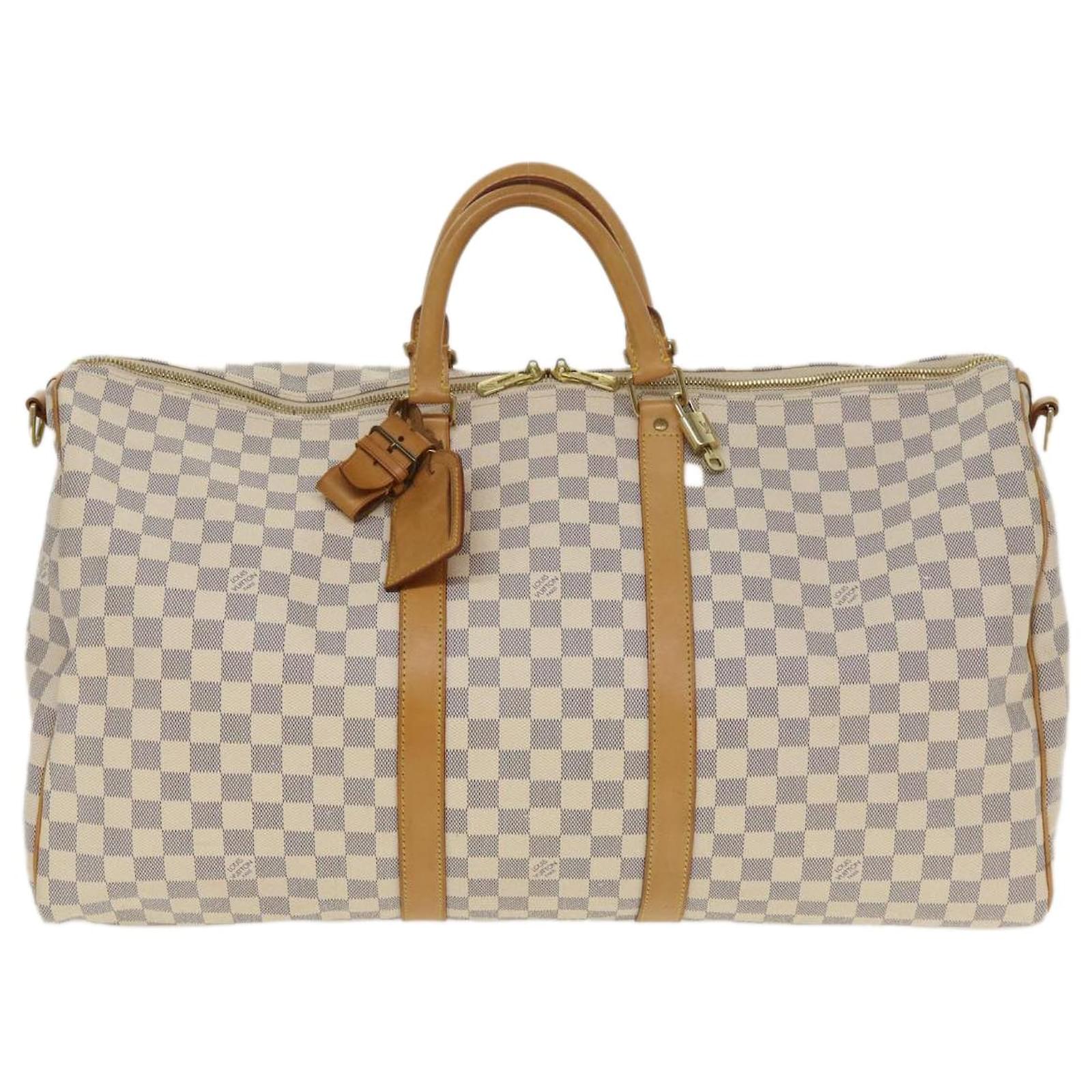 Louis Vuitton Keepall 55 Duffel in Damier Infini Leather with