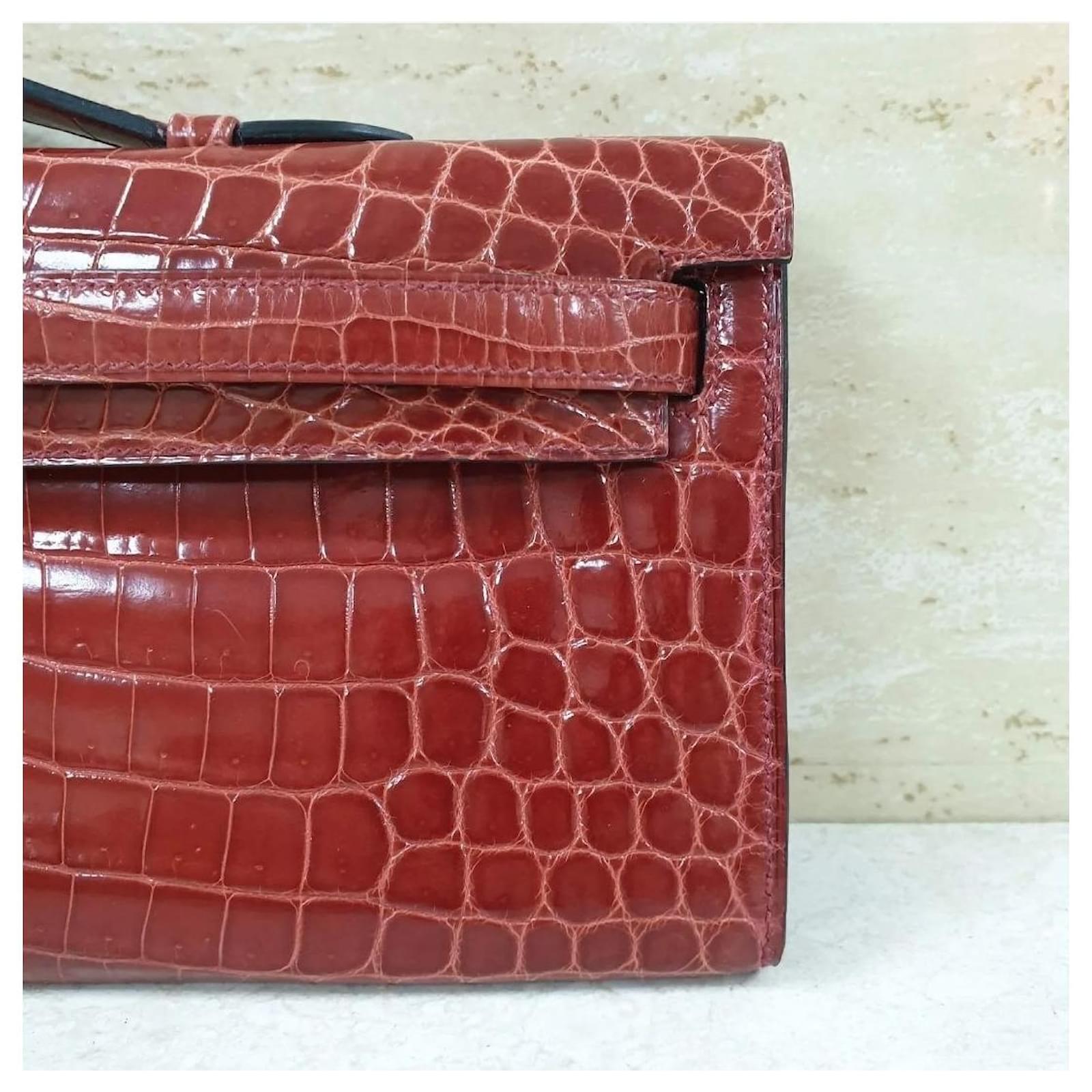 Hermès Crocodile Kelly Cut Clutch Dark red Exotic leather ref