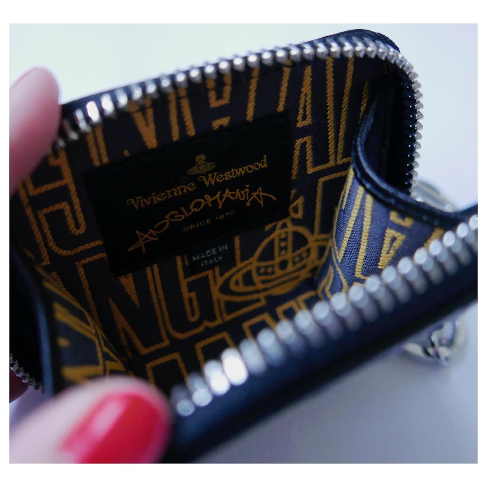 Vivienne Westwood Anglomania Orb Keyring Coin Purse Black Ostrich leather  ref.787864 - Joli Closet