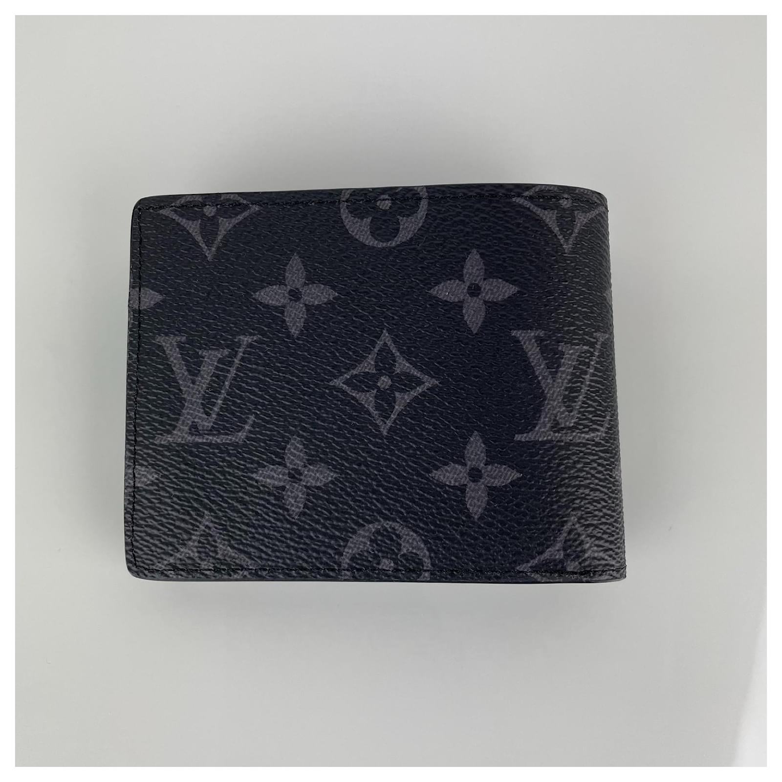 Louis Vuitton Portefeuille Slender Black Cloth ref.807542 - Joli