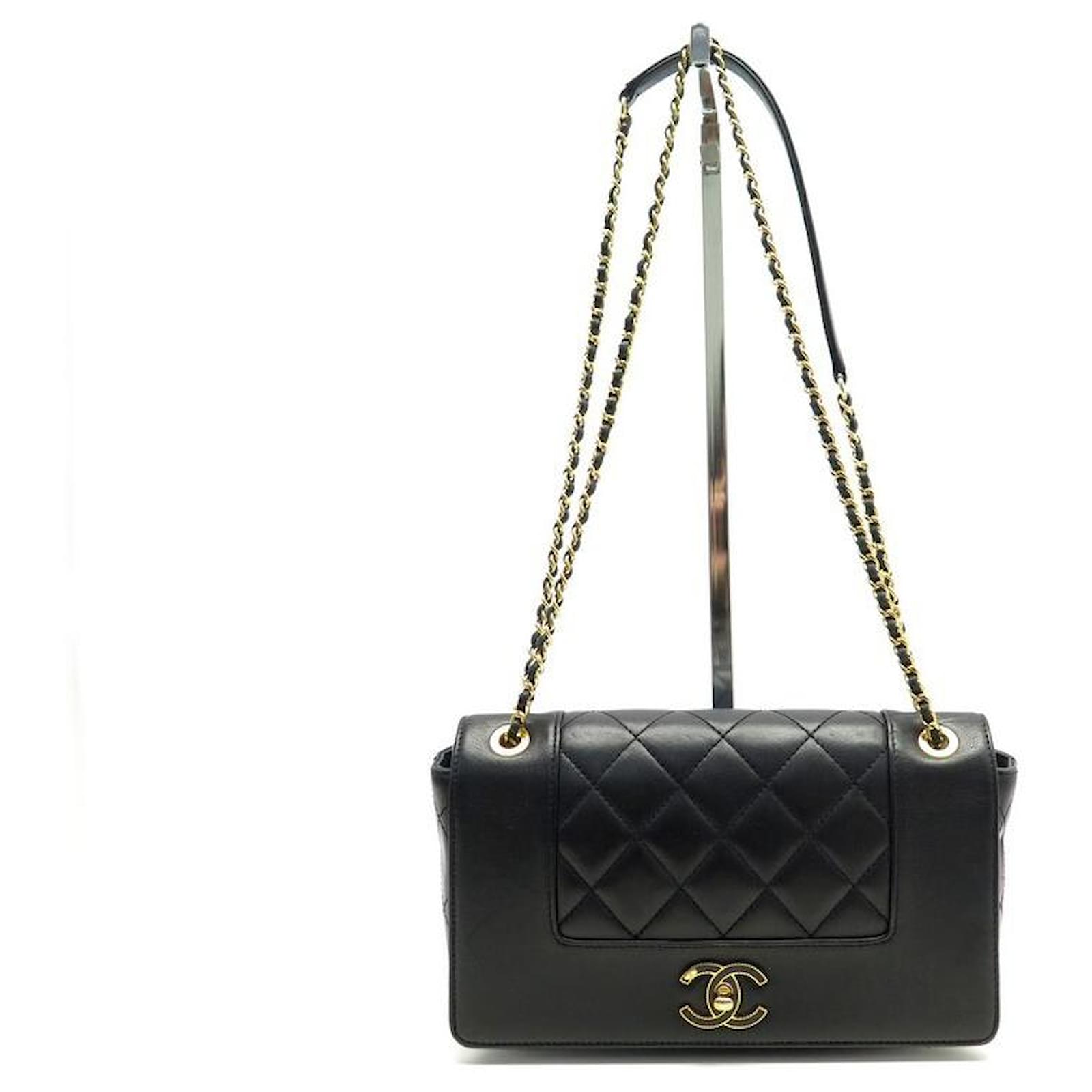 Chanel mademoiselle lock black caviar flap bag