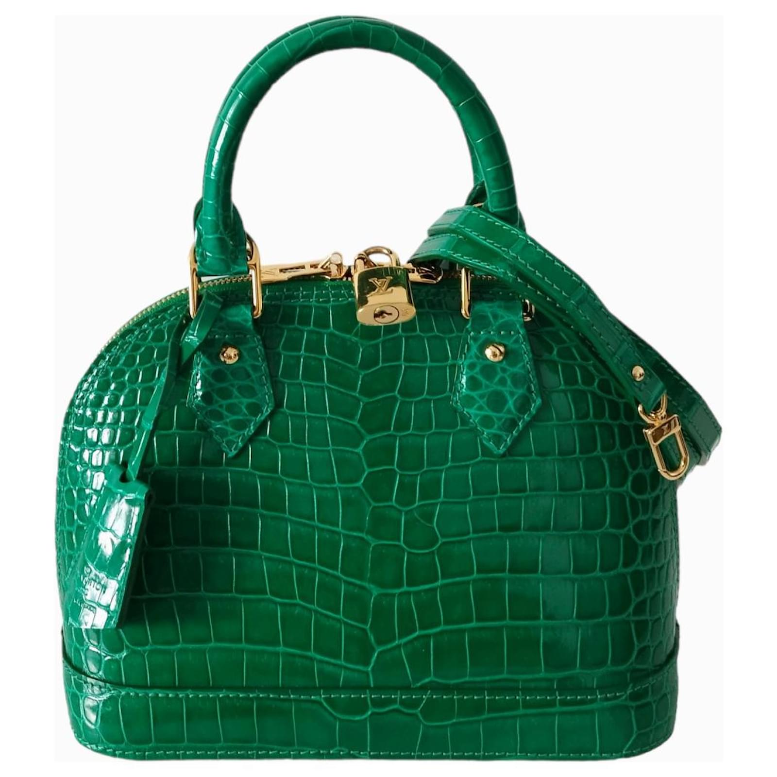 Louis Vuitton Alma BB in emerald green crocodile Exotic leather