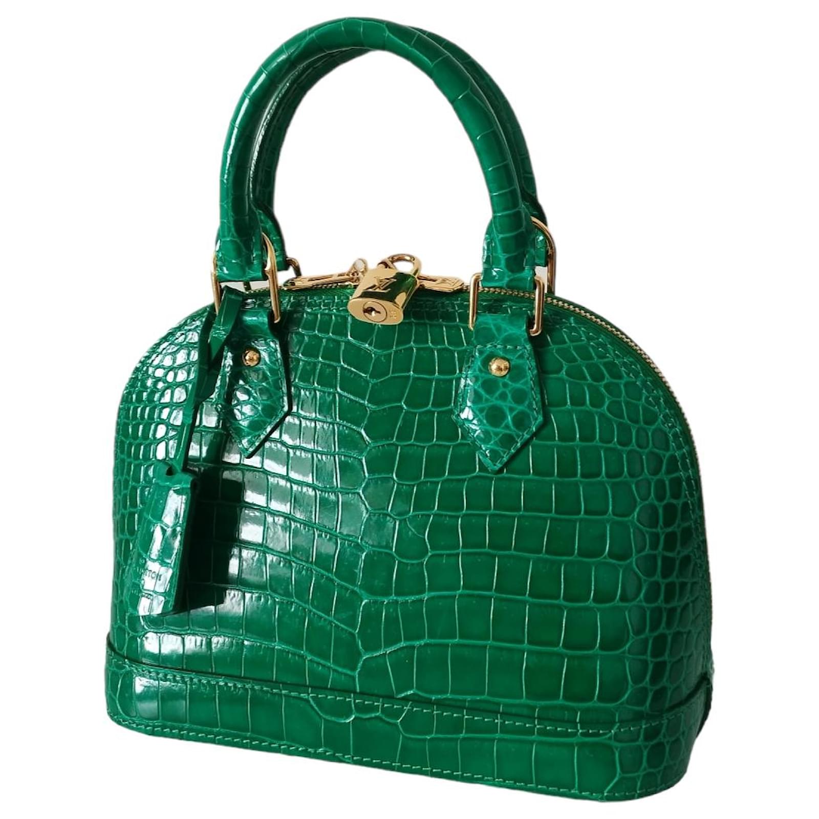 Louis Vuitton Alma BB in emerald green crocodile Exotic leather