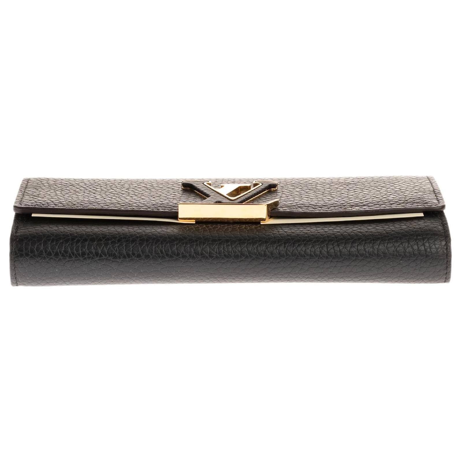 LOUIS VUITTON CAPUCINES COMPACT WALLET IN BLACK AND PINK TAURILLON LEATHER  ref.855530 - Joli Closet