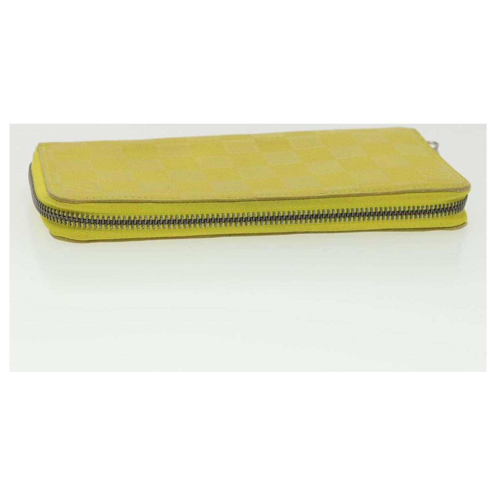 Louis Vuitton Zippy Vertical Wallet damier infini yellow leather