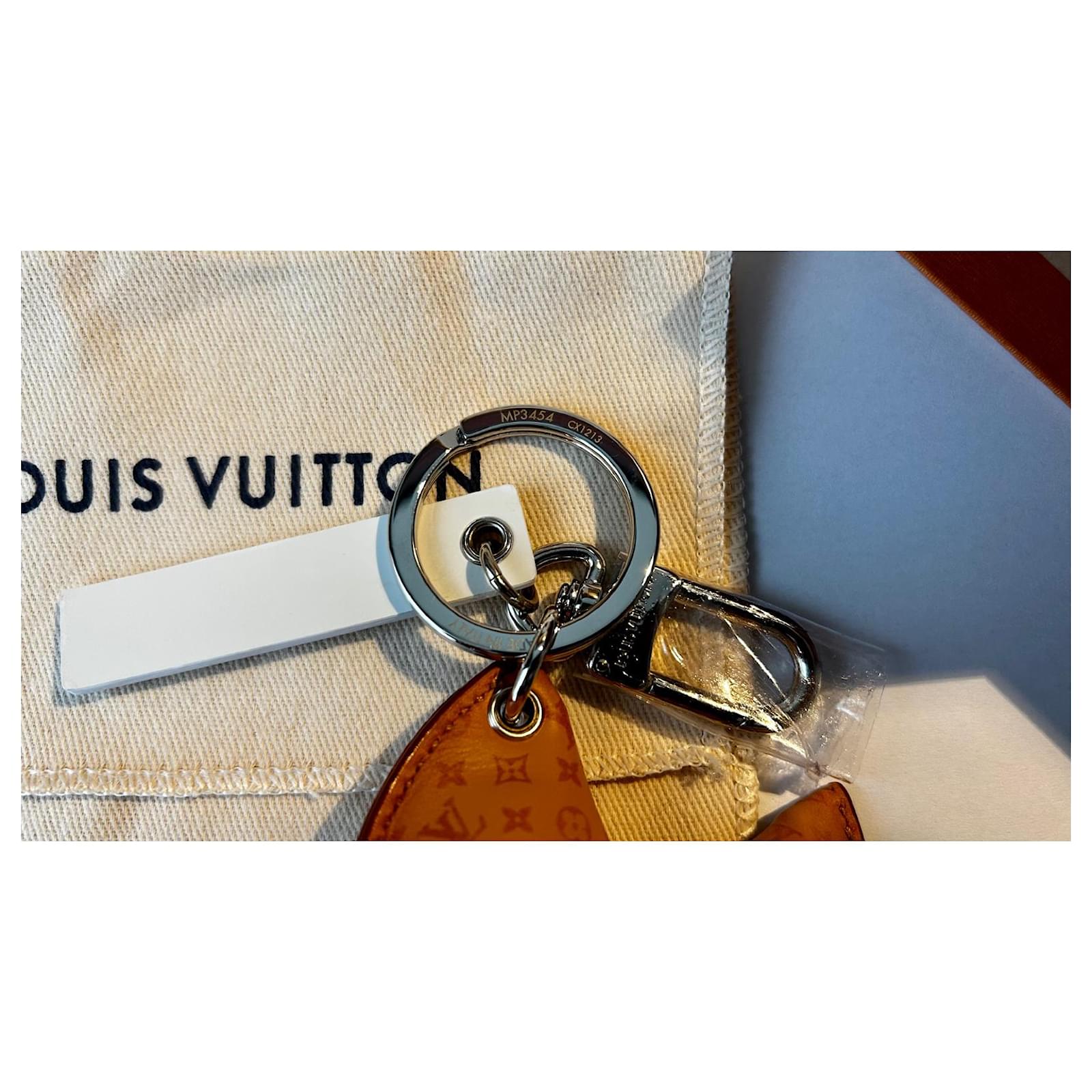 Louis Vuitton LV Fortune Cookie Bag Charm & Key Holder Brown in