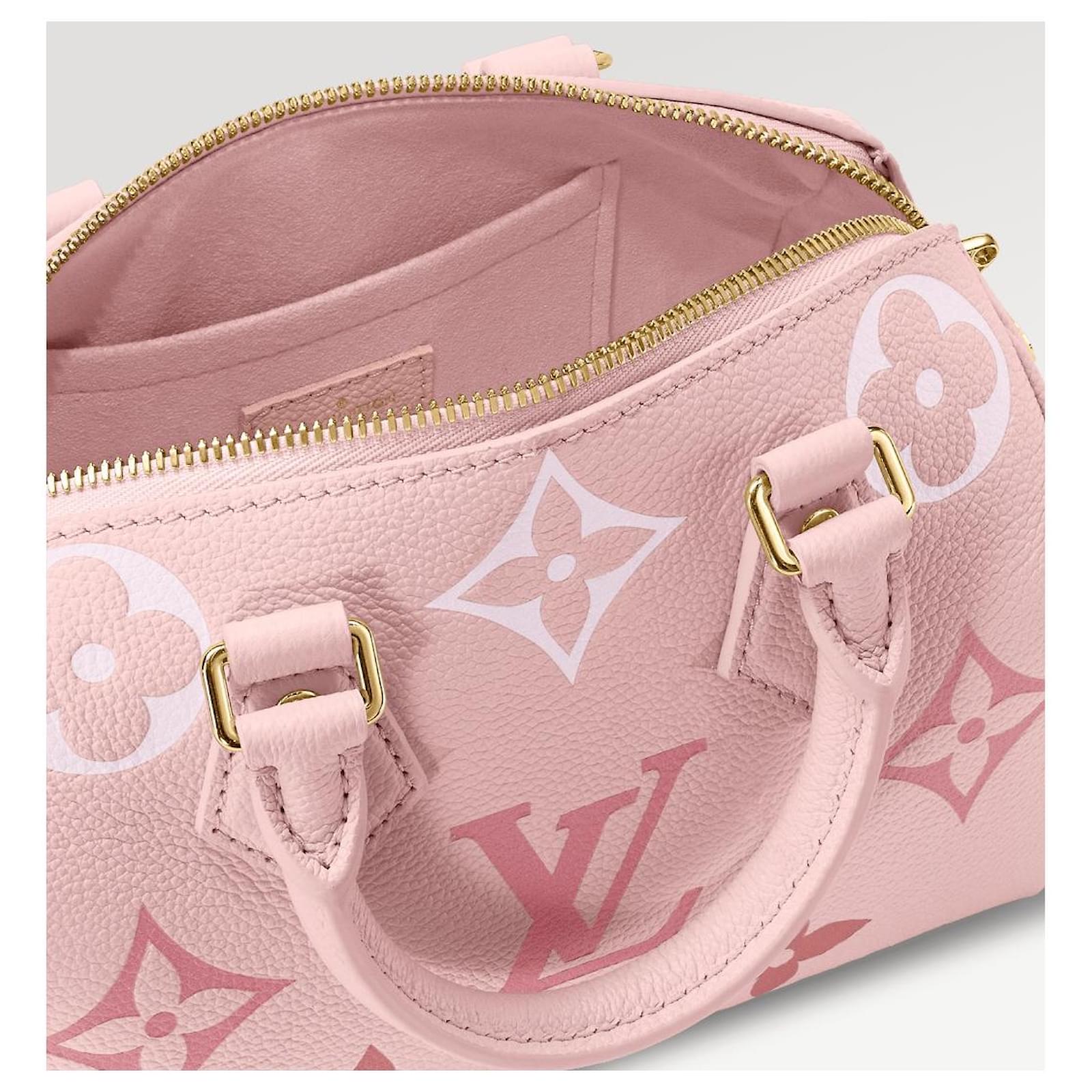 Pink/white LV woman speedy handbag in 2023