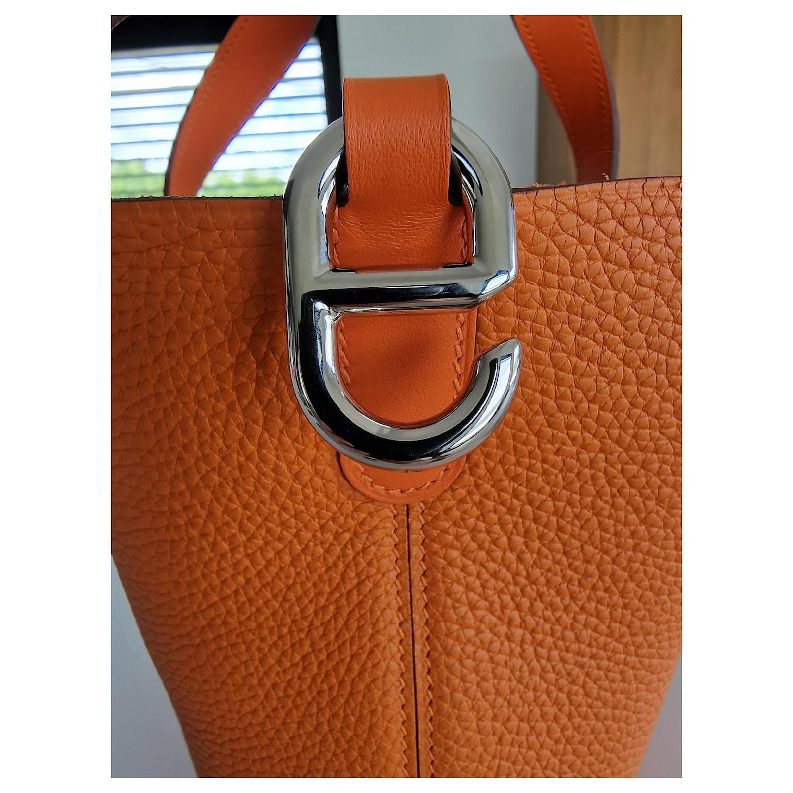 In-the-loop leather handbag Hermès Orange in Leather - 35511292