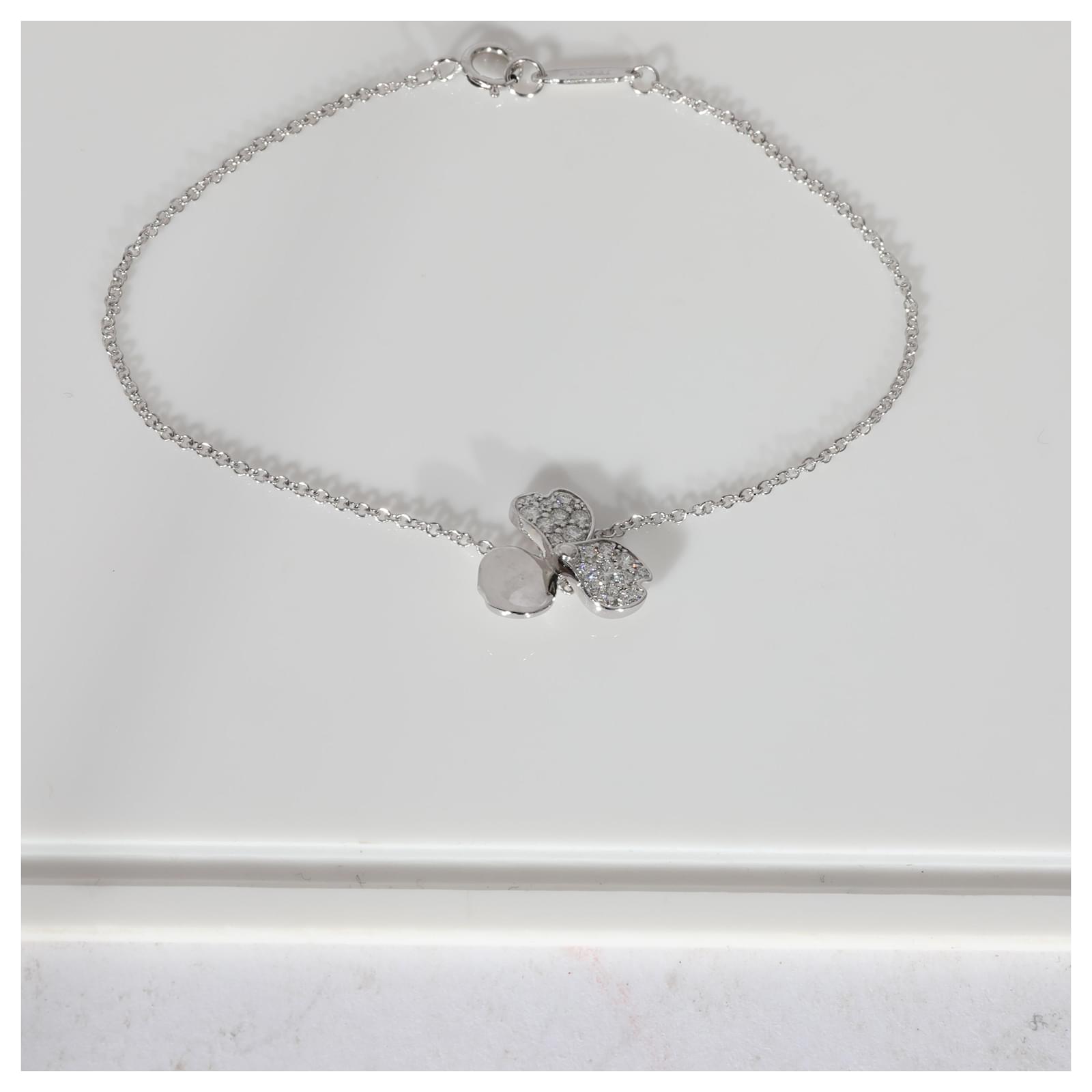 Tiffany Paper Flowers™ diamond firefly pendant in platinum, medium. |  Tiffany & Co.