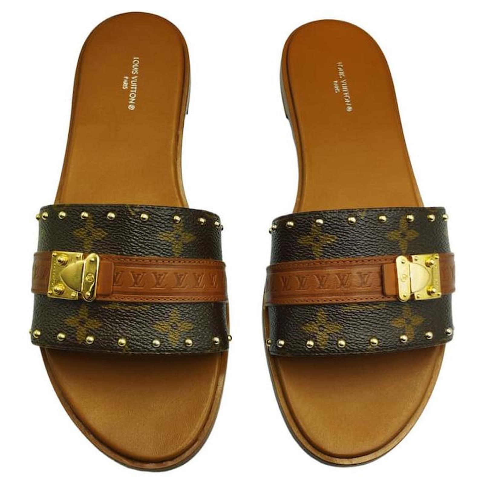 Lock it leather mules Louis Vuitton Brown size 36 EU in Leather