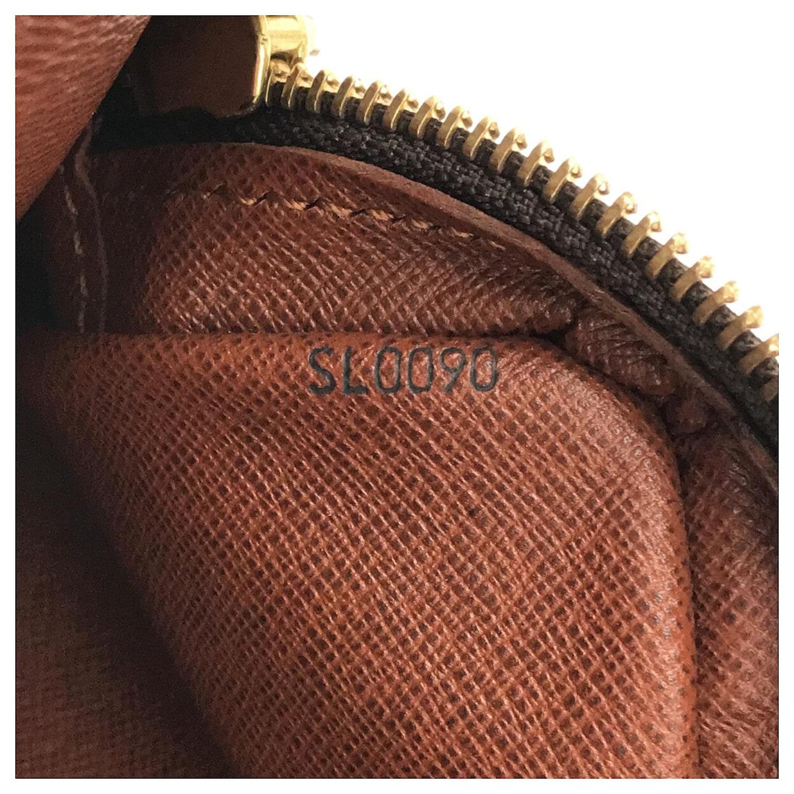 Louis Vuitton Pochette Marly Brown Cloth ref.932035 - Joli Closet