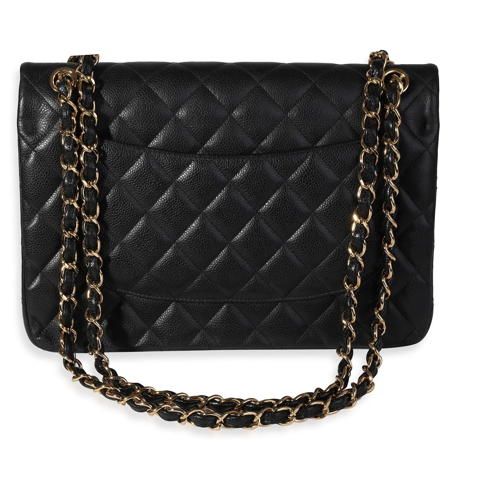 Timeless Chanel Black Quilted Caviar Jumbo Classic Double Flap Bag