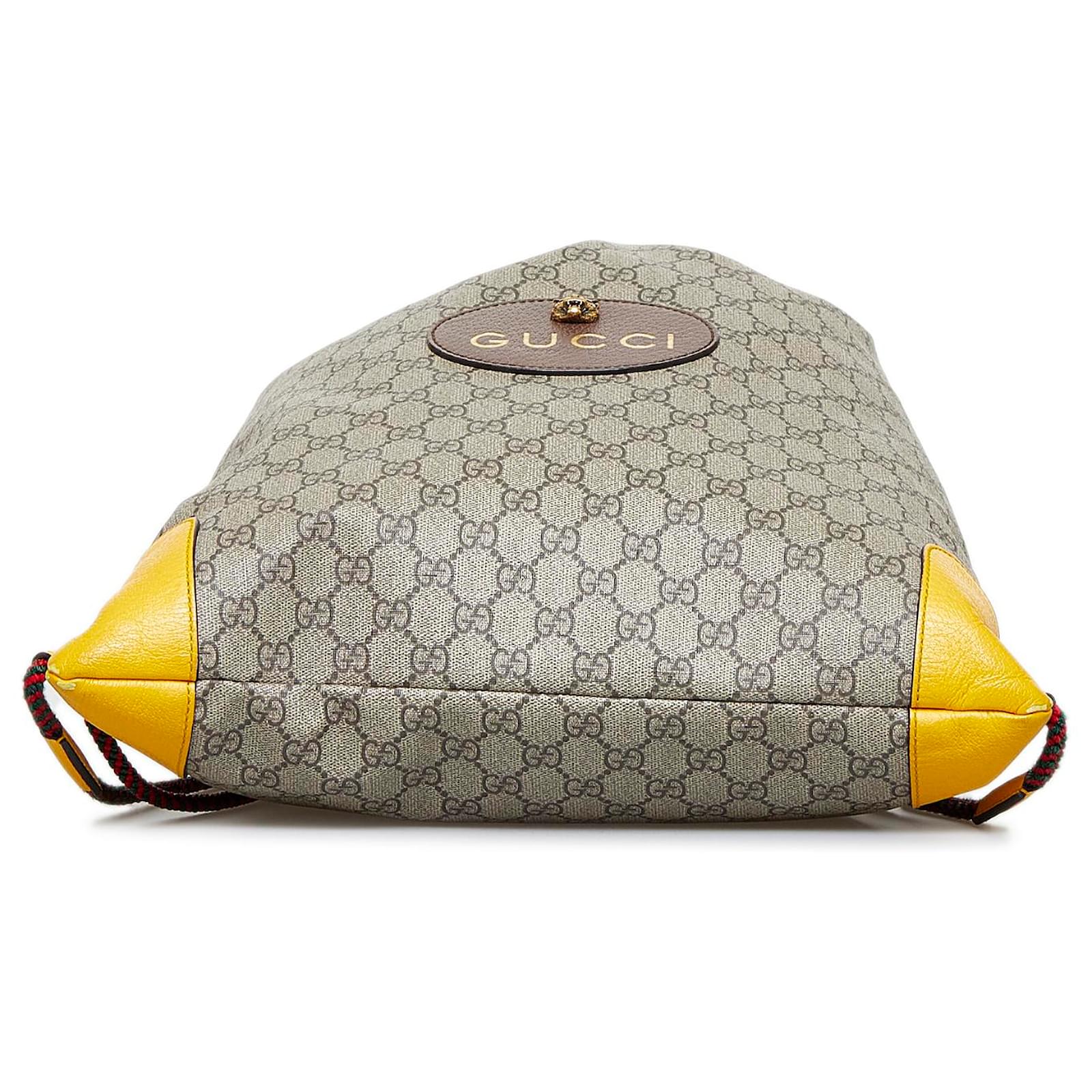Neo Vintage GG Supreme pouch in Yellow Beige GG Canvas
